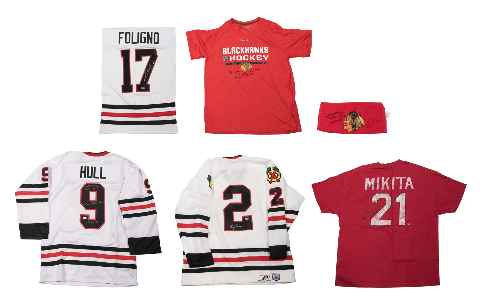 Blackhawks Signed Jerseys and Attire Assortment: Blackhawks Signed Jerseys and Attire Assortment (6) items signed by Bobby Hull, Nick Foligo, Doug Mohns, all having COA as well as Stan Mikita and Bobby Hull tee shirts and towels, no COA 