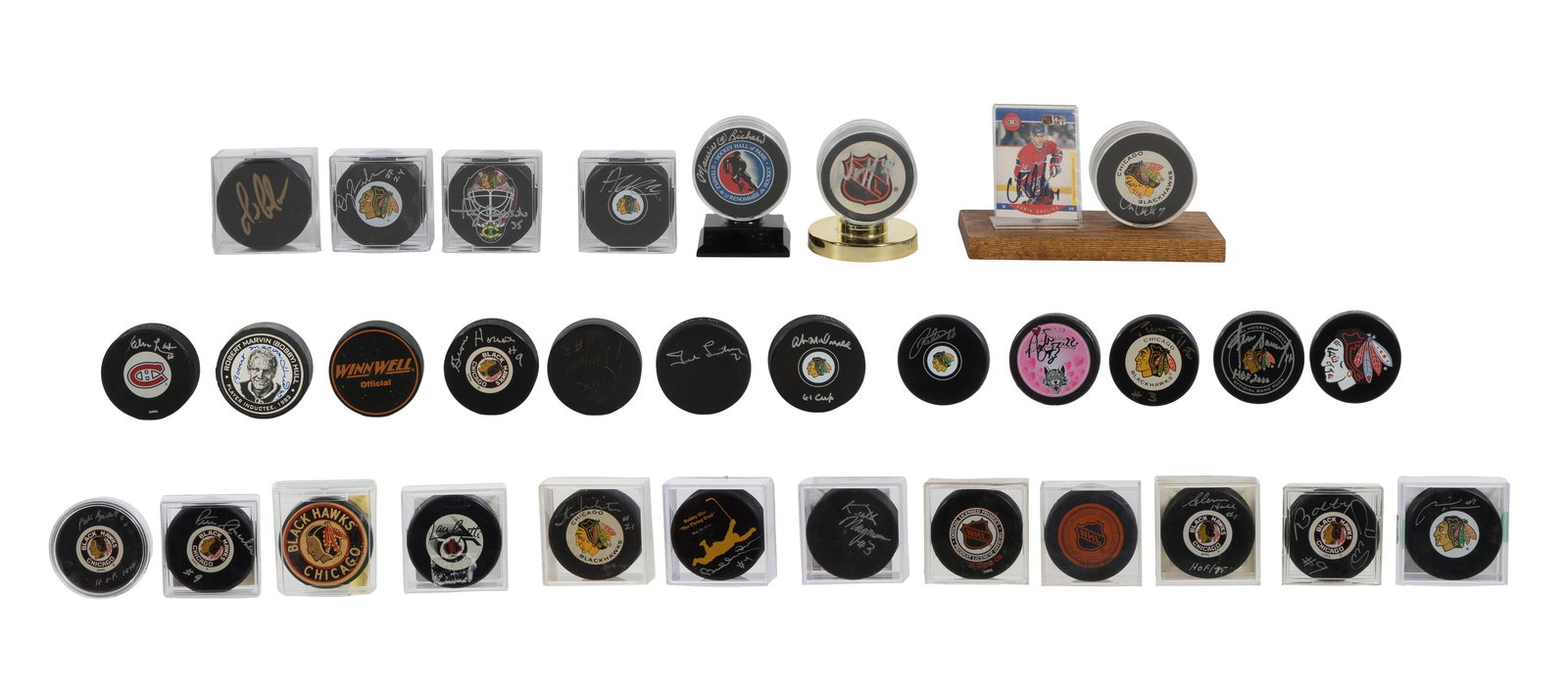 Chicago Blackhawks Signed Hockey Puck Assortment: Chicago Blackhawks Signed Hockey Puck Assortment (31) items, most in plastic cases, including a Bobby Orr #4 'The Flying Goal' having North Road Marketing hologram, a Marian Hossa #61 having