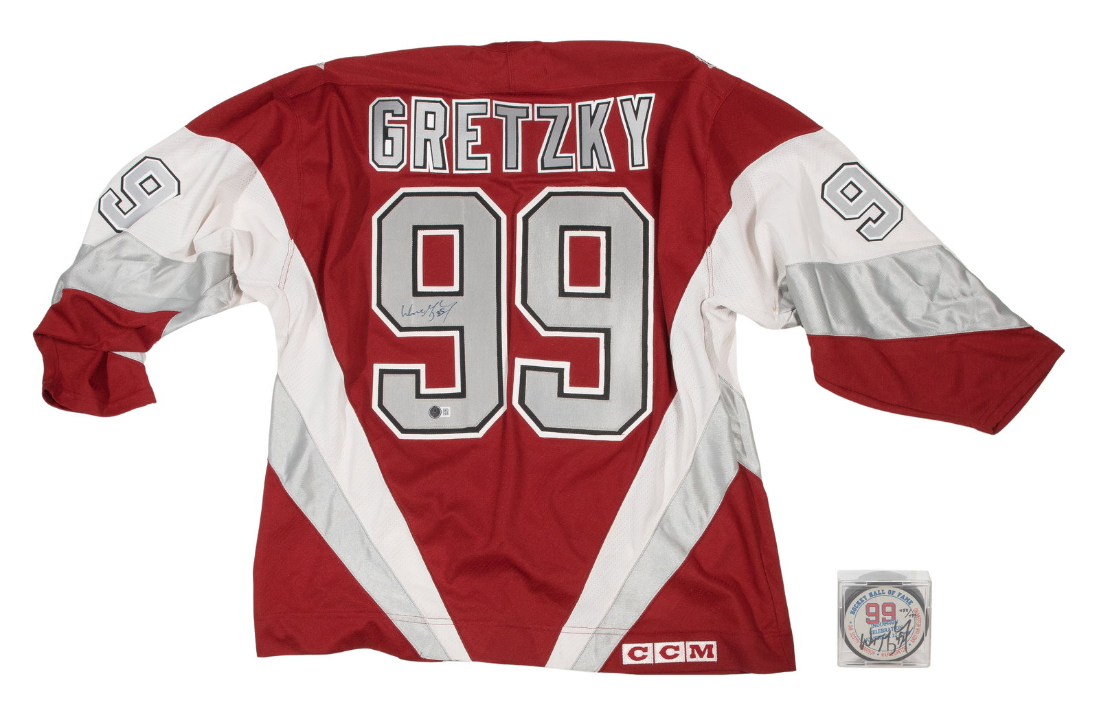 Wayne Gretzky Signed Jersey, Beckett COA: Wayne Gretzky Signed Jersey, Beckett COA (2) total items including a signed CCM jersey having Beckett COA; together with an induction to the Hockey Hall of fame puck, signed having hologram in an