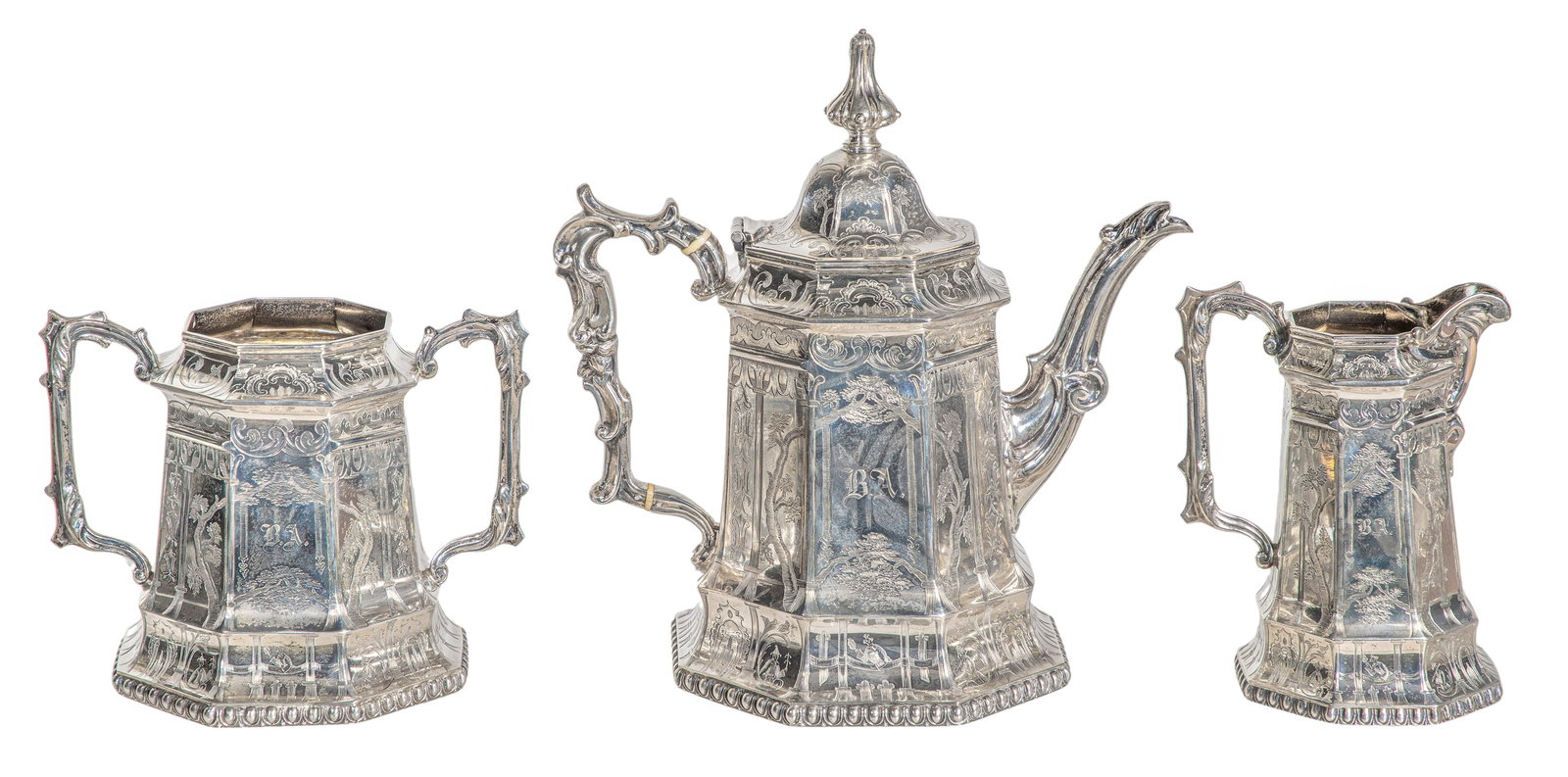George Angell Sterling Silver Partial Tea Service: George Angell Sterling Silver Partial Tea Service (3) items including a c.1853 teapot, creamer and waste bowl, all having engraved scenes (hallmarked and having lion passant) Property from: a Private