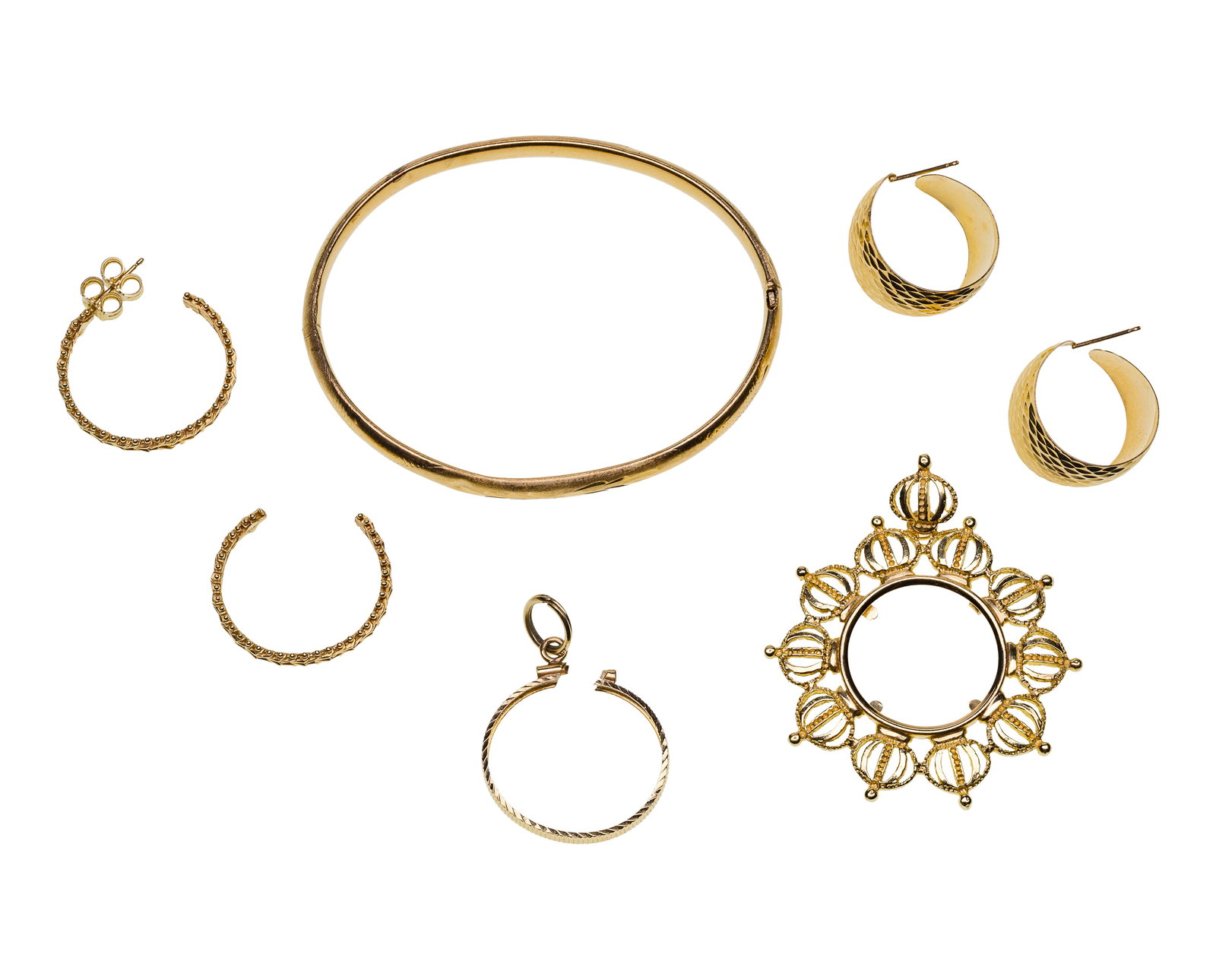 14k Yellow Gold Jewelry Assortment: 14k Yellow Gold Jewelry Assortment (5) items including (2) pairs of pierced earrings, a hinged bangle bracelet and (2) coin bezels (most marked '14k') Property from: a Private Collector, Peoria, Illin