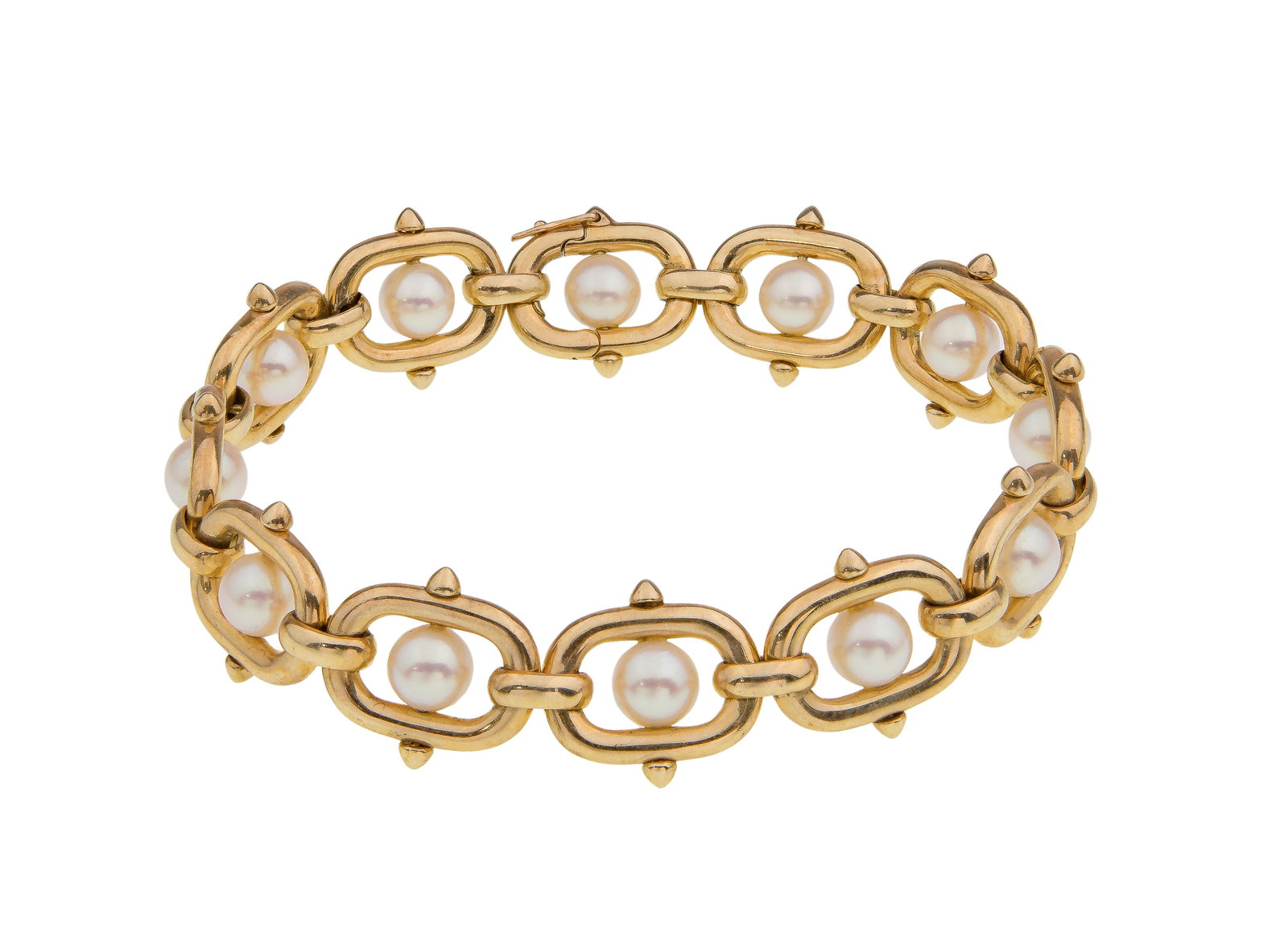 14k Yellow Gold and Pearl Bracelet: 14k Yellow Gold and Pearl Bracelet An oval link style bracelet having an approximately 6mm floating pearl in the center of each link (marked '585') Property from: a Private Collector, Peoria, Illinois