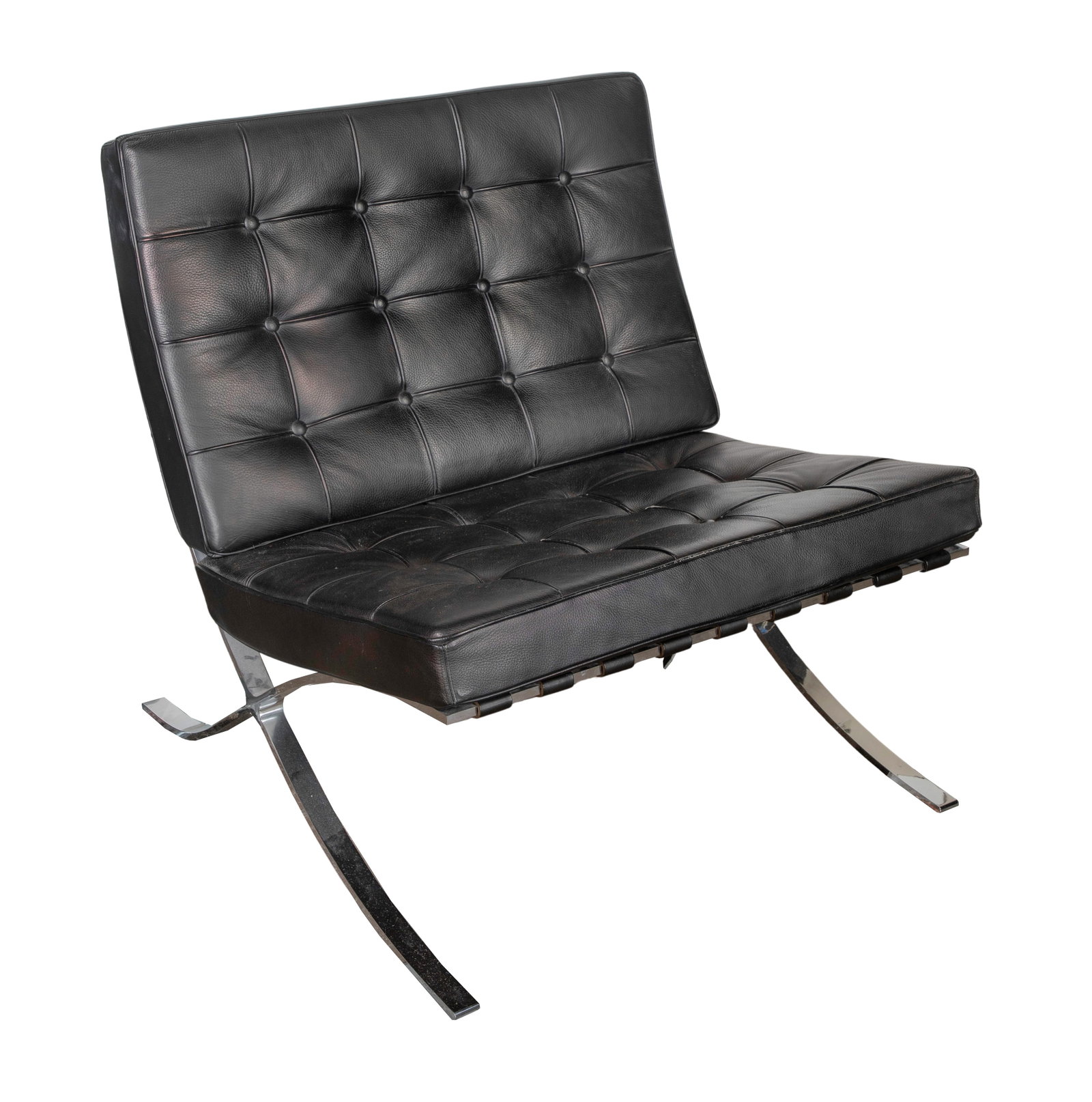Barcelona Style Chair after Mies van der Rohe: Barcelona Style Chair after Mies van der Rohe Having black tufted leather upholstery, steel X-frame and ribbon legs Property from: an Estate, Evanston, Illinois Height: 31 inches, Width: 32 inches,