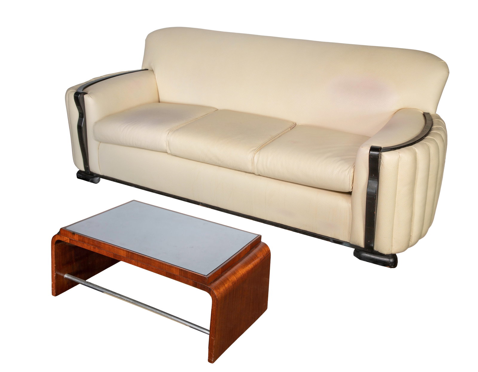 Art Deco Style Sofa and Coffee Table: Art Deco Style Sofa and Coffee Table (2) items including a stream-line leather and bent wood accent modern style sofa and a dark wood waterfall style table having a black glass top Property from: an