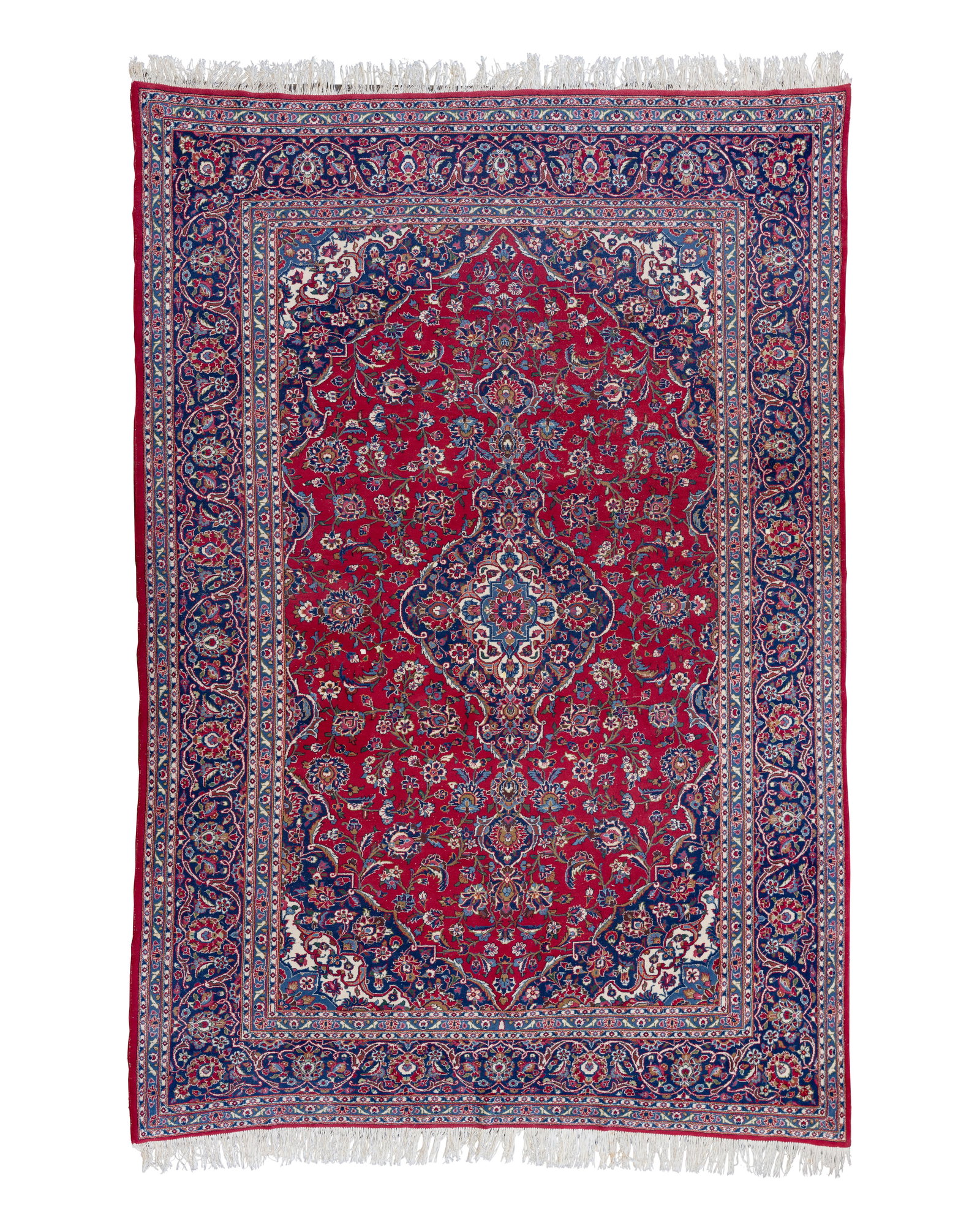 Persian Wool Rug: Persian Wool Rug Hand knotted having an abstract floral design in hues of blue, cream, tan and green on a red field Property from: an Estate, Evanston, Illinois Rug Size: 12 ft. 1 in. by 8 ft. 2 in.