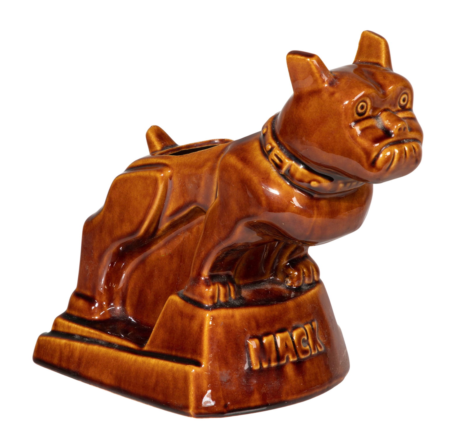 Mack Truck Logo Ceramic Planter: Mack Truck Logo Ceramic Planter The Mack bulldog mascot represented in brown glazed pottery having raised 'Mack' on the front of the base and 'Sold and Distributed By / Mack Shops / Mack Trucks Inc.'