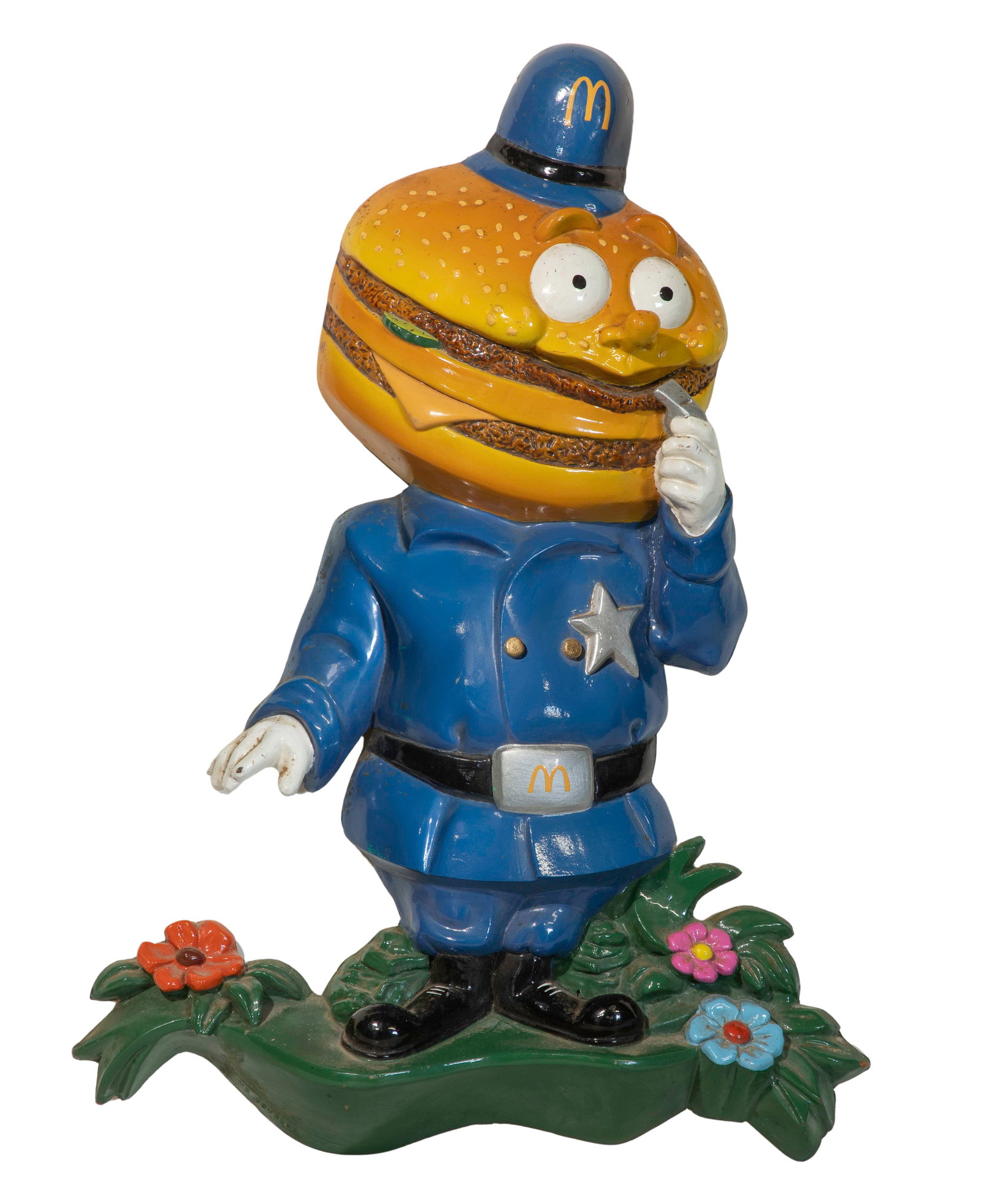 McDonalds Officer Big Mac Advertising Signage: McDonalds Officer Big Mac Advertising Signage An expanded urethane molded and painted depiction of the character having molded 'McDonalds T.M.' at lower edge, wall mount Property from: an Estate,