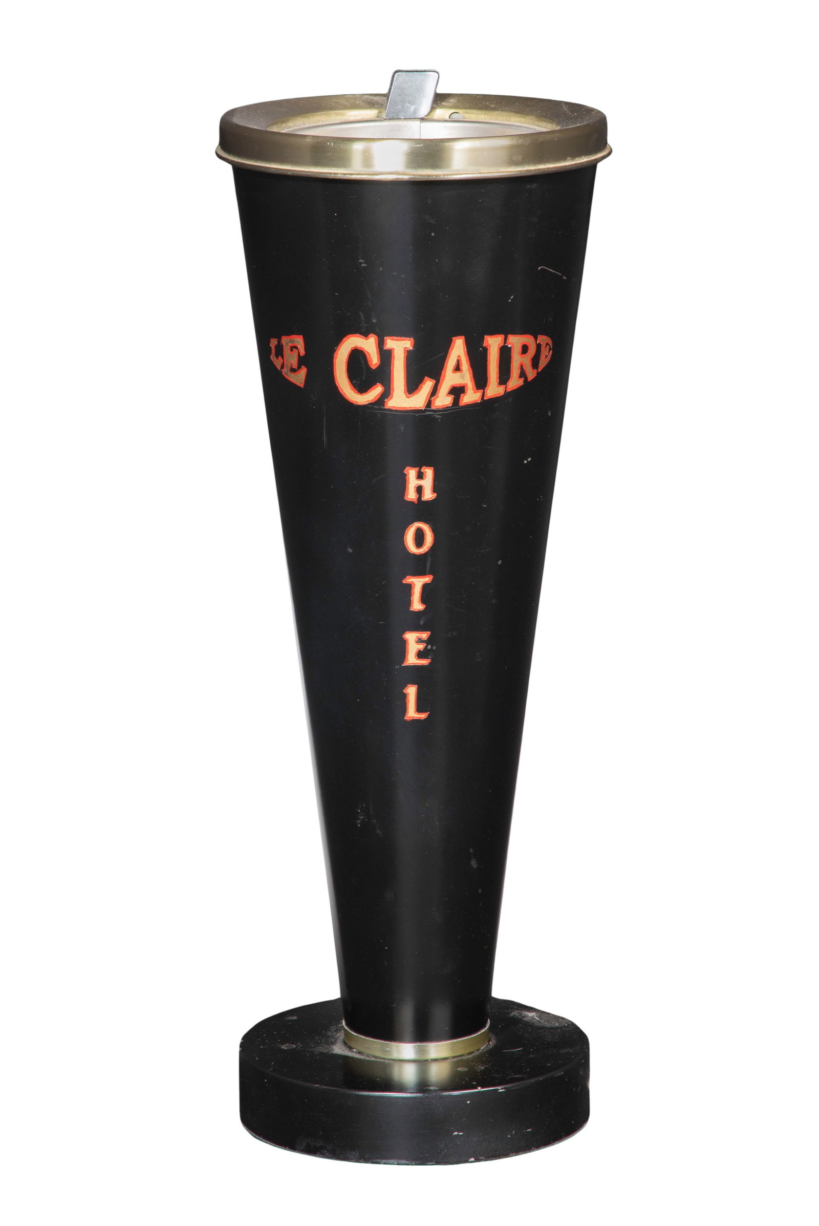 Le Claire Hotel Smokador Ashtray: Le Claire Hotel Smokador Ashtray A tall conical metal stand having a weighted base, a 'Duk-It' push style ashtray on top, gold-tone lettering labels on stand 'Le Claire Hotel' Property from: an