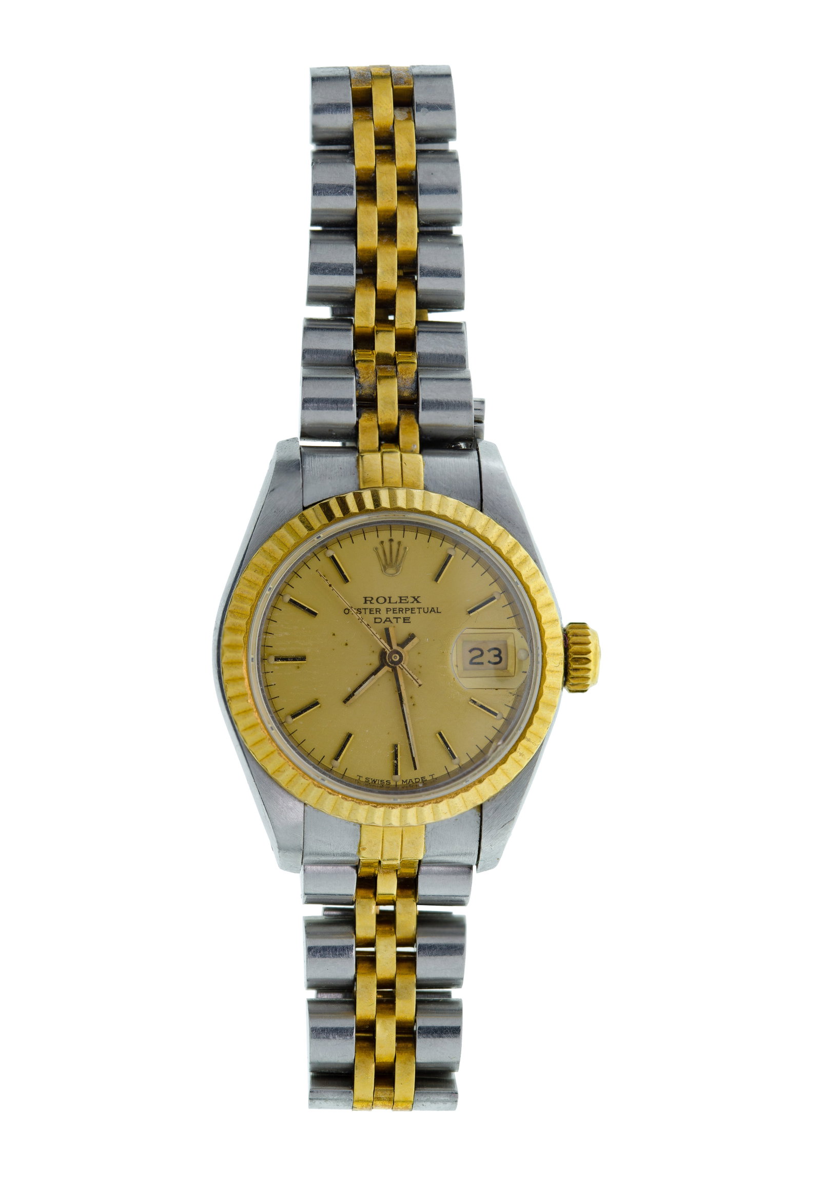 Rolex Oyster Perpetual Stainless Steel Wristwatch: Rolex Oyster Perpetual Stainless Steel Wristwatch c.1985, reference #6900, serial #02850, gold-tone bezel, champagne dial, tapered hands, stick indices, jubilee bracelet having deployment clasp,