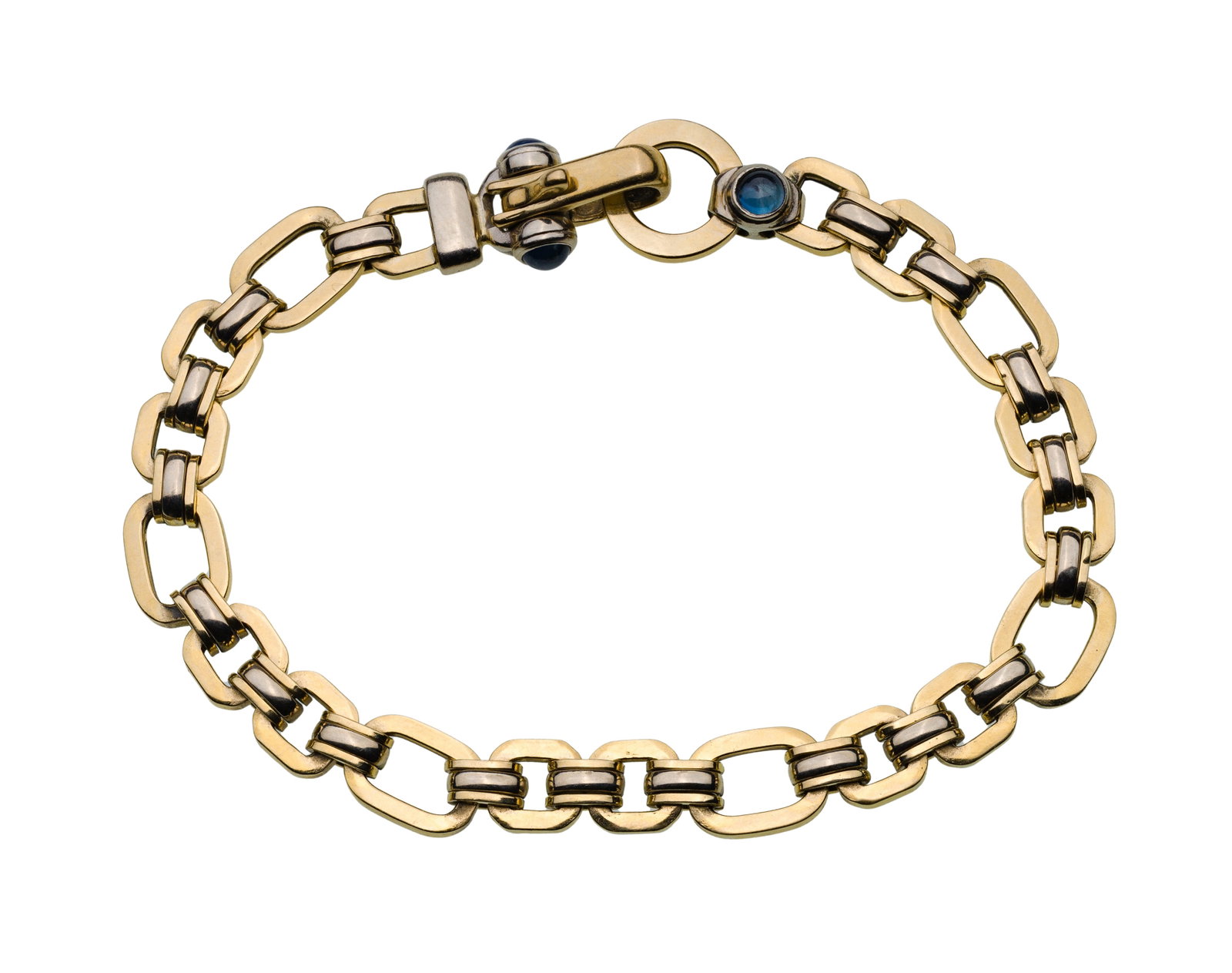14k Yellow and White Gold and Sapphire Bracelet: 14k Yellow and White Gold and Sapphire Bracelet A bi-color mariner style 0.25-inch wide link having bezel set sapphires at clasp (marked '14k') Property from: a Private Collector, Westmont, Illinois