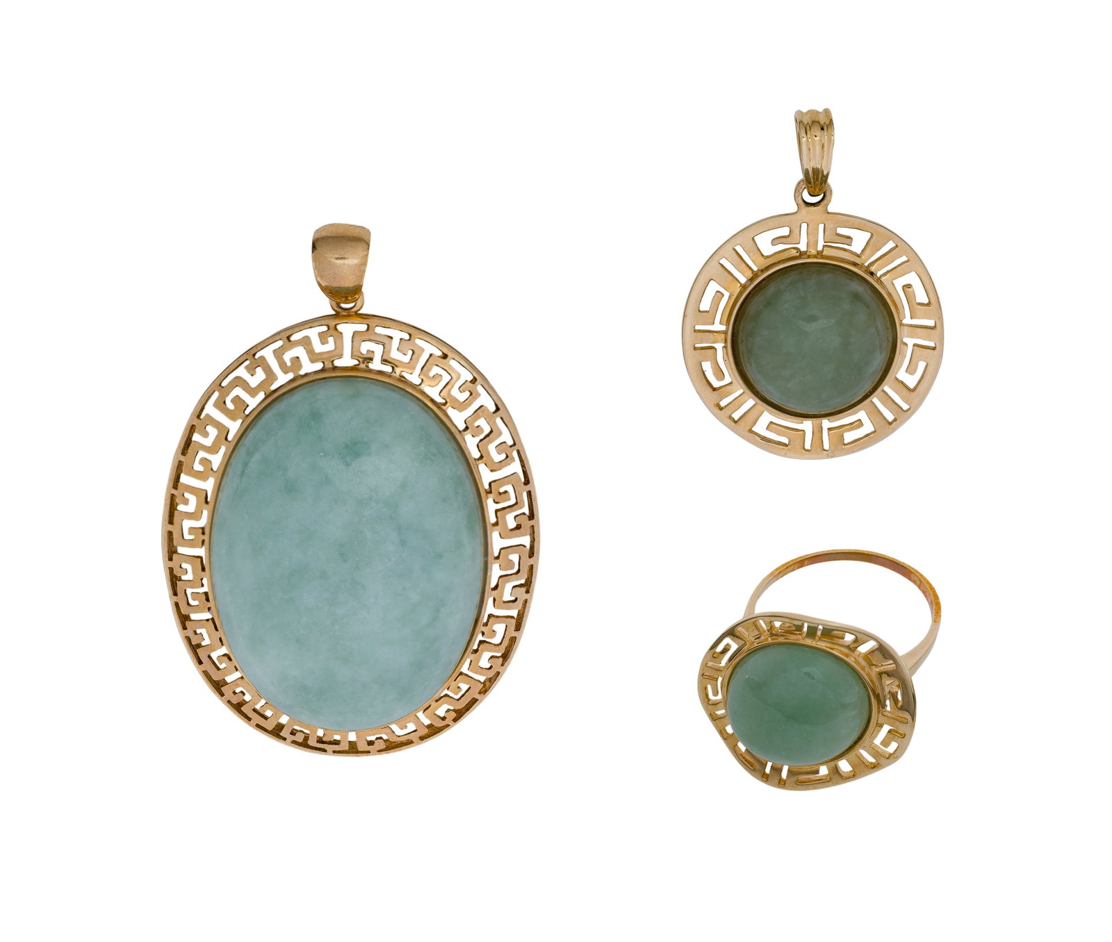 14k Yellow Gold and Jadeite Jade Jewelry Suite: 14k Yellow Gold and Jadeite Jade Jewelry Suite (3) items including an oval cut ring in a setting, a round cut pendant in a setting and an approximately 30mm x 22mm oval cut pendant having an openwork 