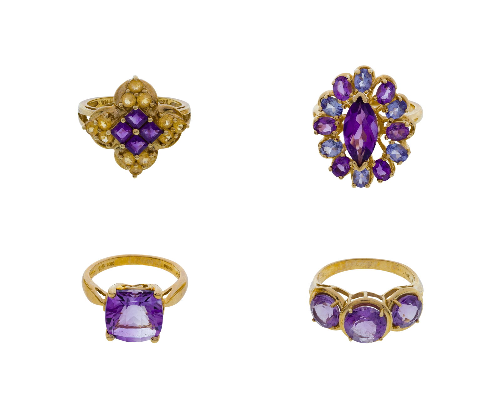 10k Yellow Gold and Amethyst Ring Assortment: 10k Yellow Gold and Amethyst Ring Assortment (4) items having various cuts of purple gemstones (all marked '10k') Property from: a Private Collector, Westmont, Illinois Size: 6 (multi-gemstones), 5