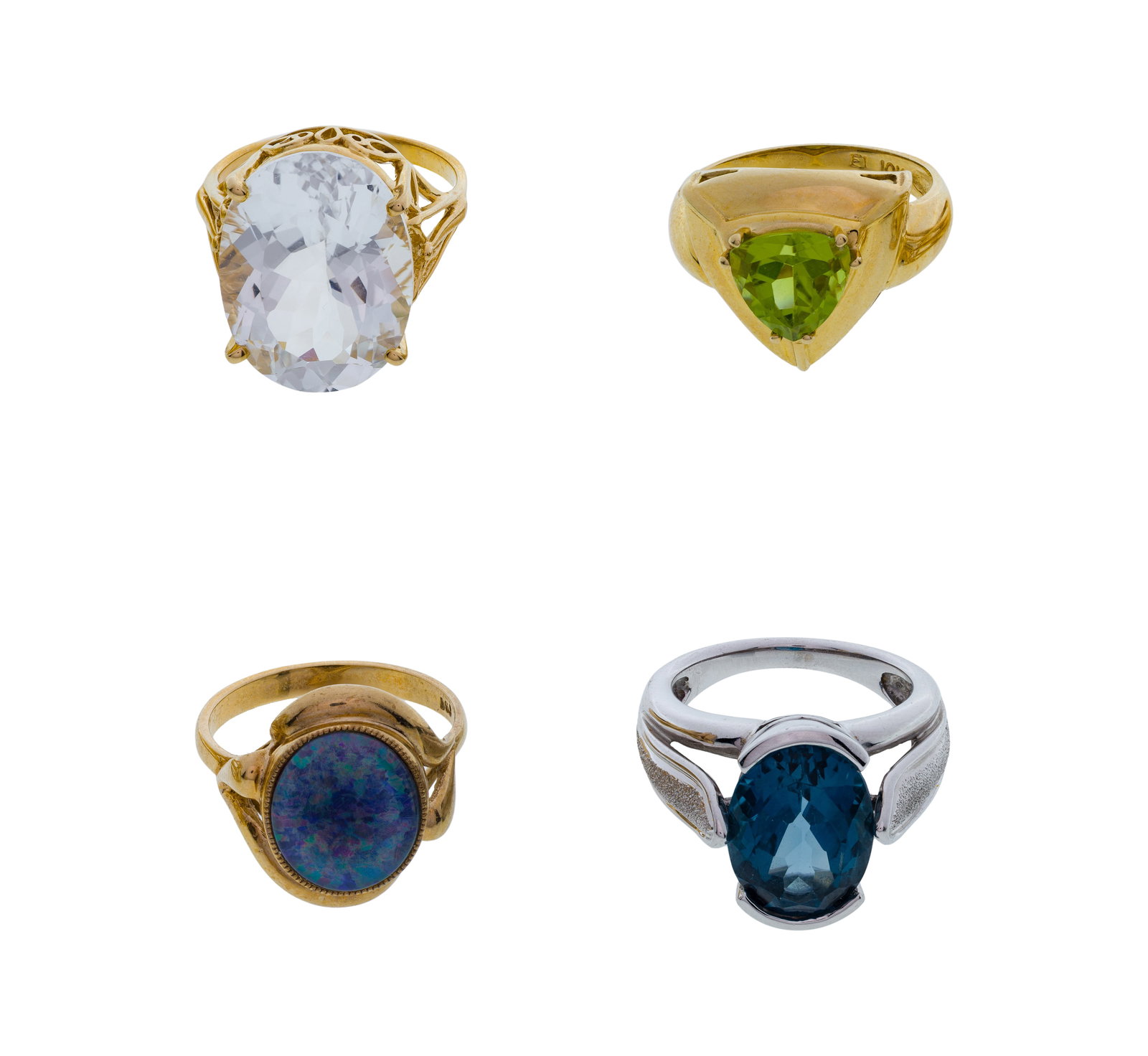 10k Yellow Gold and Gemstone Ring Assortment: 10k Yellow Gold and Gemstone Ring Assortment (4) items including an open setting having an oval cut pale blue sapphire, a trillion cut citrine, an oval cut cabochon black opal as well as a white gold