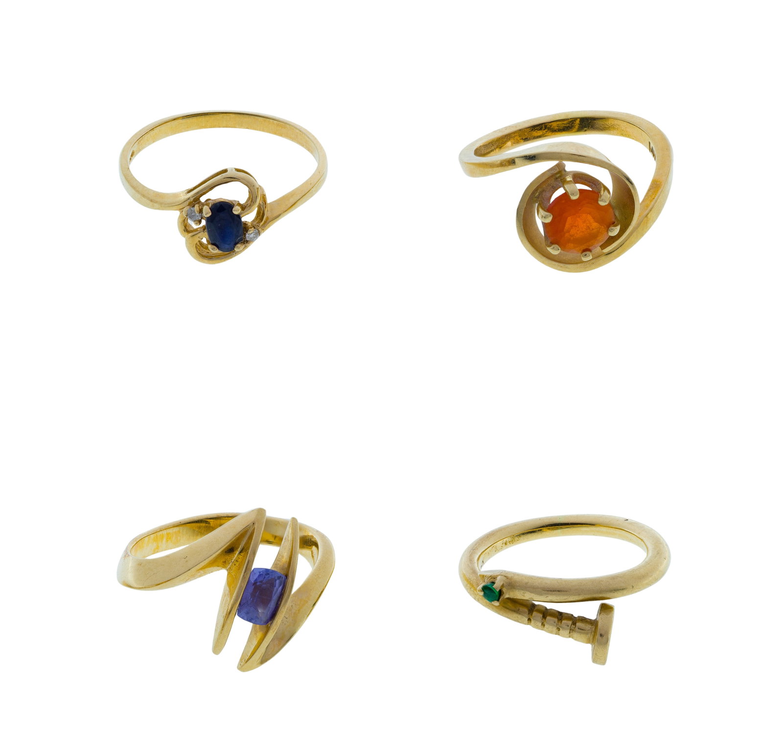 14k Yellow Gold and Gemstone Ring Assortment: 14k Yellow Gold and Gemstone Ring Assortment (4) items including an amethyst in a modernist setting, an emerald in cross over nail setting, an oval sapphire and diamond and a round cut orange quartz