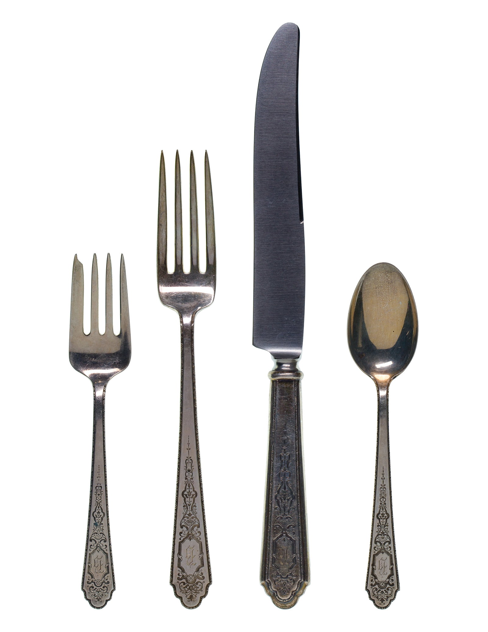 Treasure Mary II Sterling Silver Flatware Service: Treasure Mary II Sterling Silver Flatware Service (32) items including (6) 9 3/4-inch dinner knives, (6) 7 3/4-inch dinner forks, (5) 6-inch salad forks, (12) 6 7/8-inch teaspoons, (3) serving utensil