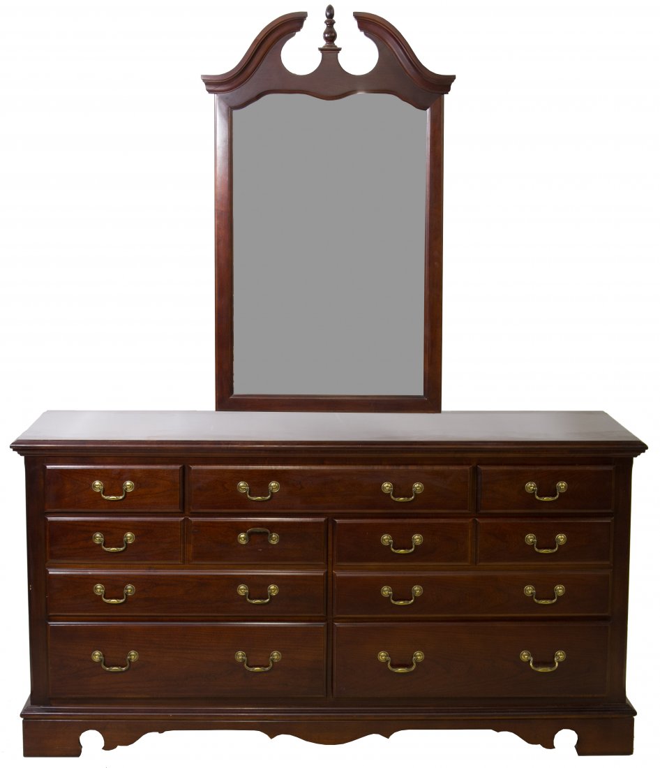 Impressions Walnut Stained Dresser with Mirror by: Impressions Walnut Stained Dresser with Mirror by Thomasville Having seven drawers Height: 82.00 inches, Width: 62.00 inches, Depth: 18.00 inches Category: Furniture > American Shipping Status: 3rd Pa