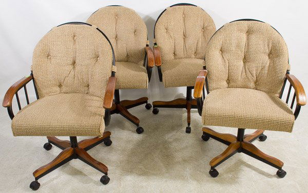 Honey Oak, Metal and Upholstered Chairs: Honey Oak, Metal and Upholstered Chairs Four chairs that rock, spin, and roll Height: 35.00 inches, Width: 25.00 inches (back height) Category: Furniture > Contemporary Shipping Status: 3rd Party Ship