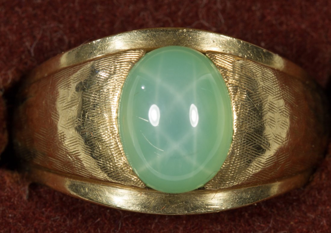 14k Gold Ring having Green Star Sapphire: 14k Gold Ring having Green Star Sapphire Weight: 3.92 dwts. (total weight) Category: Jewelry and Timepieces > 14k Gold Shipping Status: Leonard Auction, Inc. will directly ship via USPS