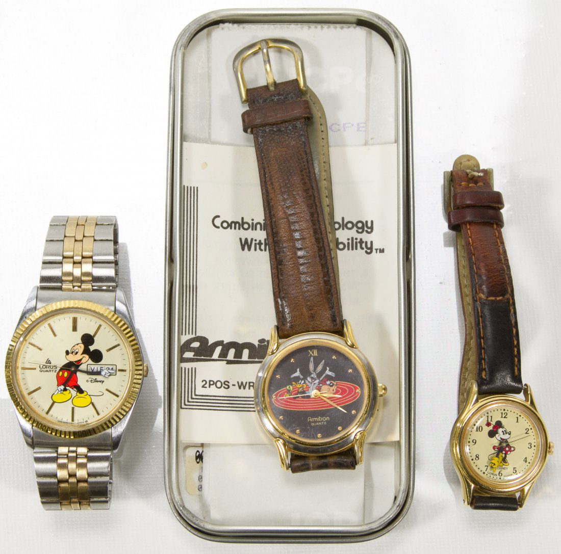 Disney Wrist Watch Assortment: Disney Wrist Watch Assortment Three pieces: (1) men's Lorus mickey mouse watch, (1) women's minnie mouse wrist watch, and (1) looney tunes wrist watch Length: 5.50 inches Category: Collectibles > Disn
