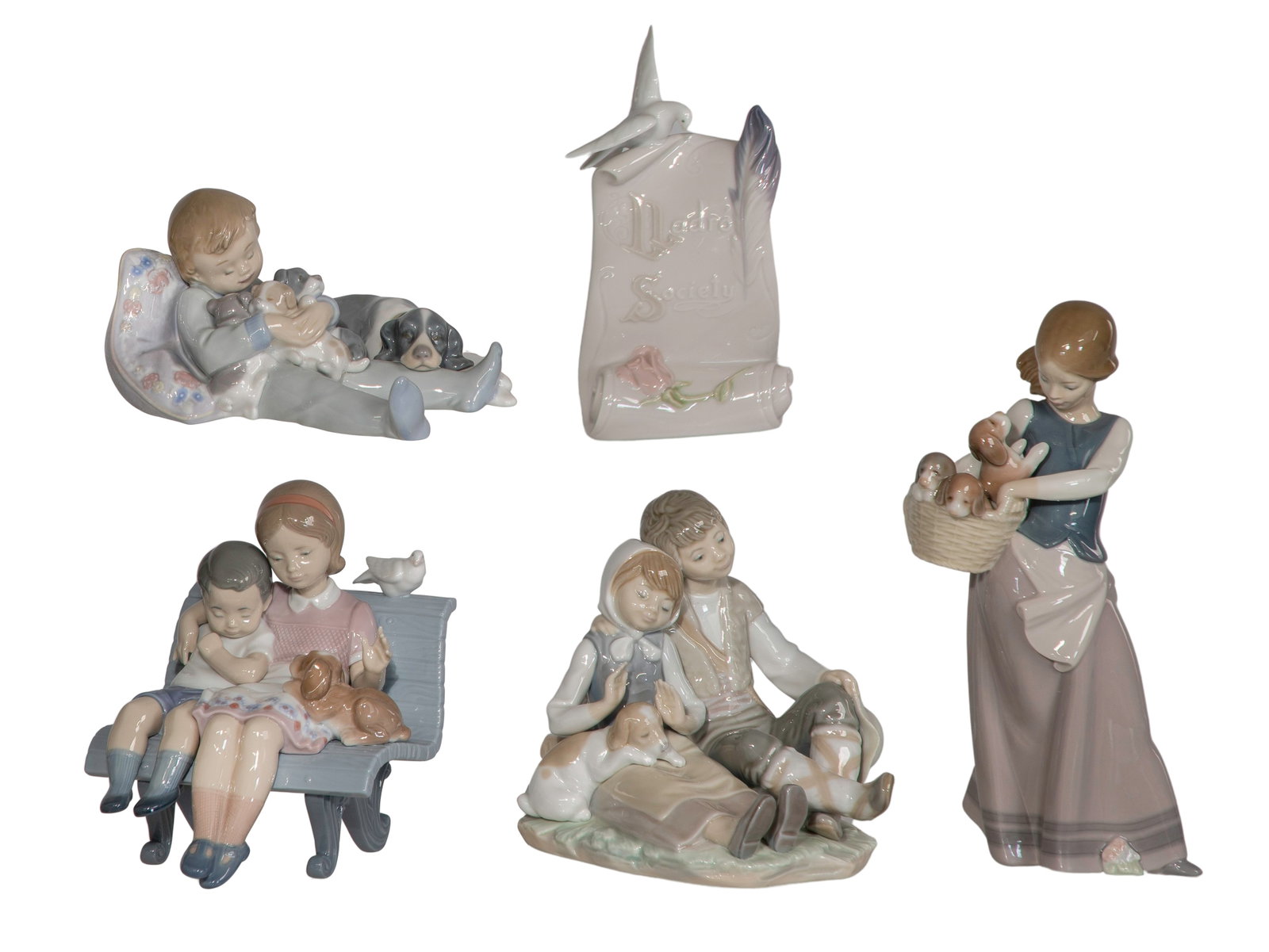 Lladro Porcelain Figurine Assortment: Lladro Porcelain Figurine Assortment (7) total items including #1311, #1230, #1535, #6446 and a #7677 plaque; together with (2) hardcover Lladro catalogs including 1998-99 and 2000-2001 Property
