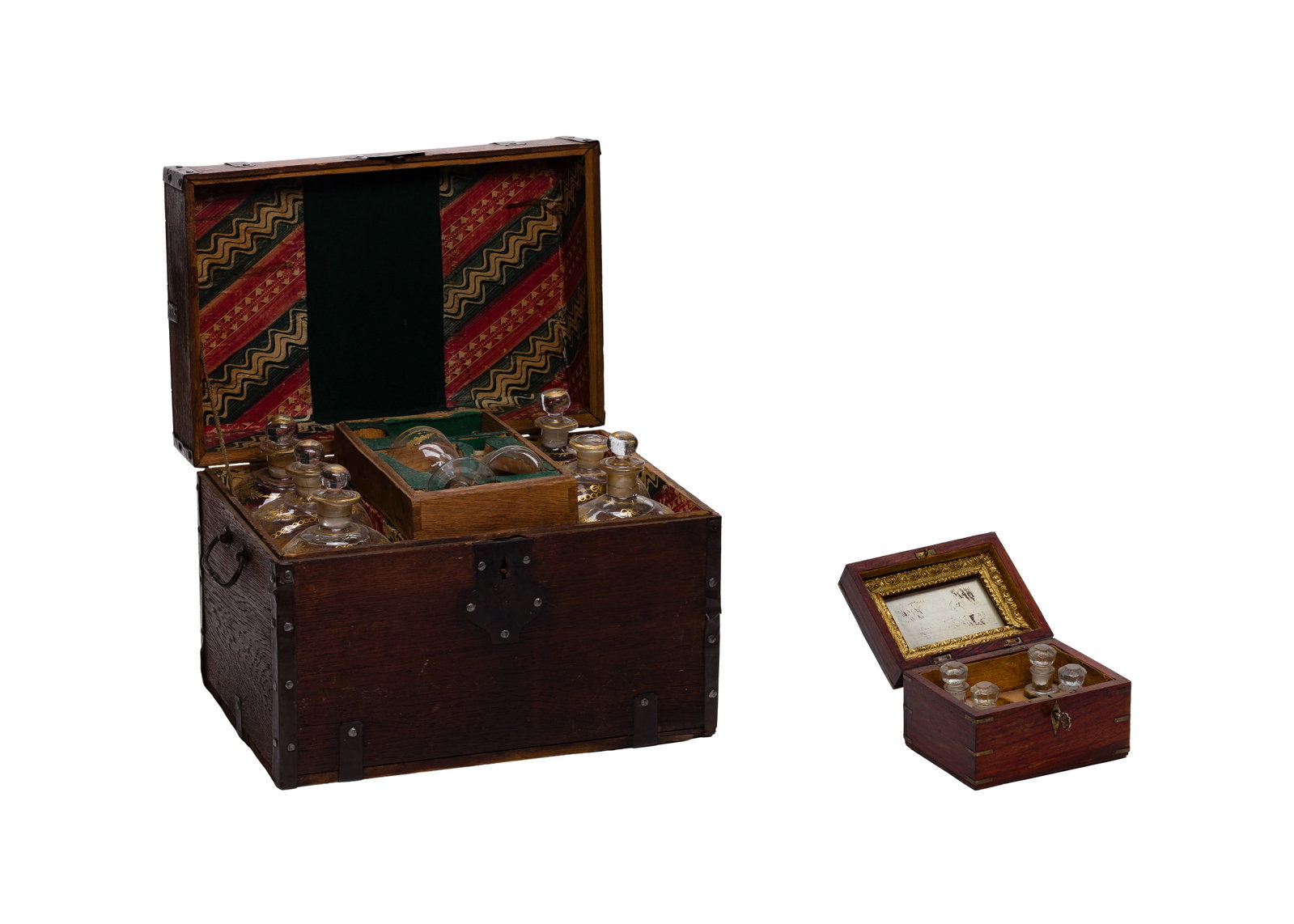 Tantalus and Vanity Box: Tantalus and Vanity Box (2) items including a traveling liquor chest having interior bottles and glasses as well as a perfume casket having a mirror on lid, (4) bottles and key Property from: an