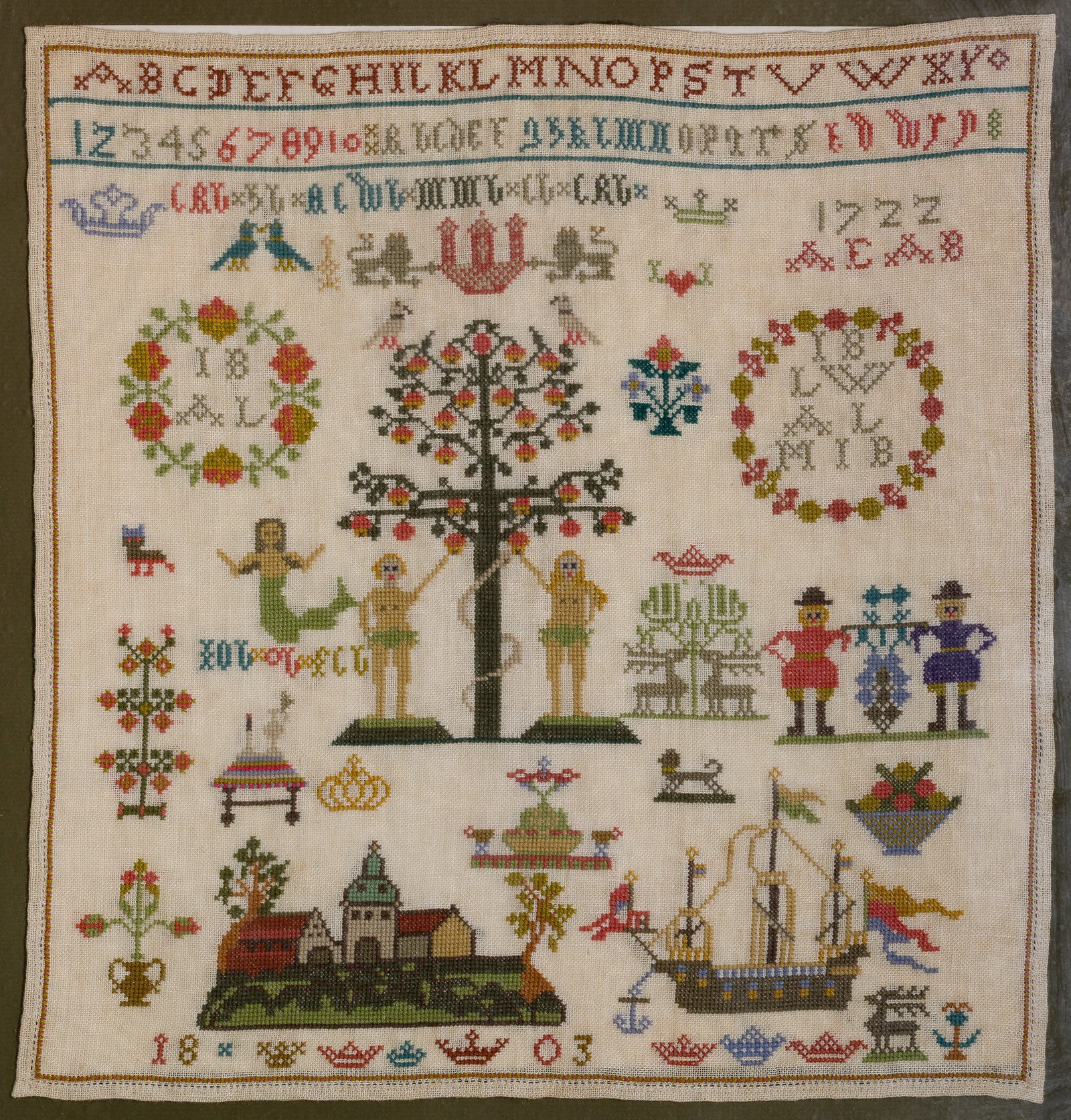 Danish Embroidered Sampler: Danish Embroidered Sampler In the Haandarbetets Fremme (Danish Handcraft Guild) style, designed by Ida Winkler a cross stitch depicting Adam and Eve, floated in a wood frame Property from: an Estate,