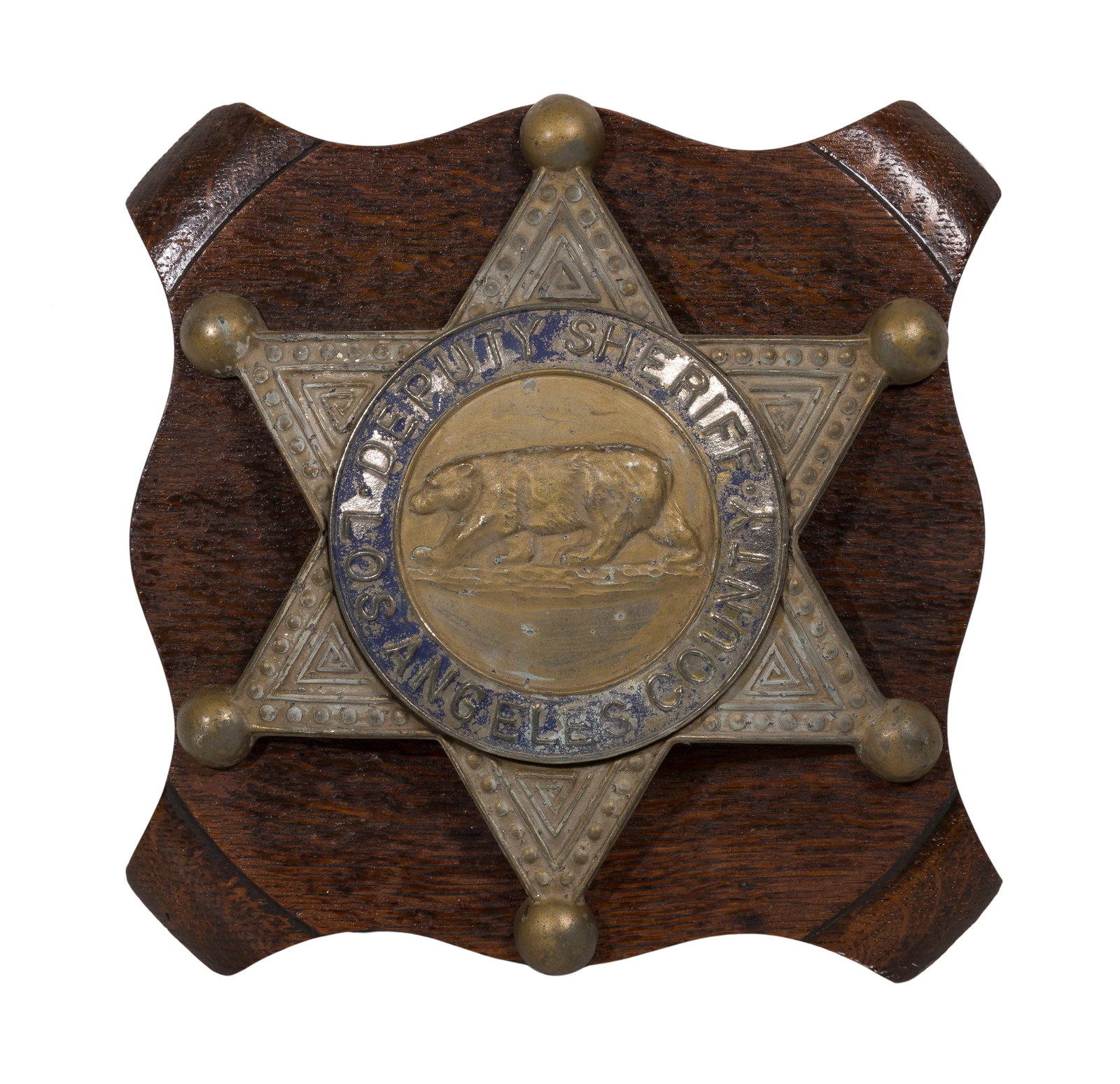 Los Angeles County Deputy Sheriff Cast Metal Wall Plaque: Los Angeles County Deputy Sheriff Cast Metal Wall Plaque A cast metal star having a walking bear device, mounted on a wood plinth Property from: a Private Collector, Glen Ellyn, Illinois Height: 12