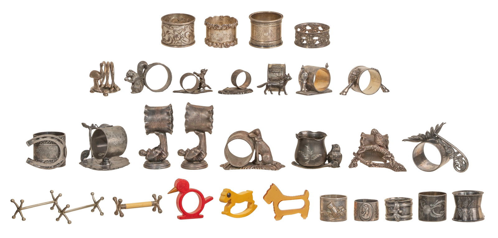 Napkin Ring Assortment: Napkin Ring Assortment (30) total items including (4) silver (unmarked 925), (18) silver plated having attached sculptural figural elements, (2) engraved silver plate and (3) Bakelite style; together 