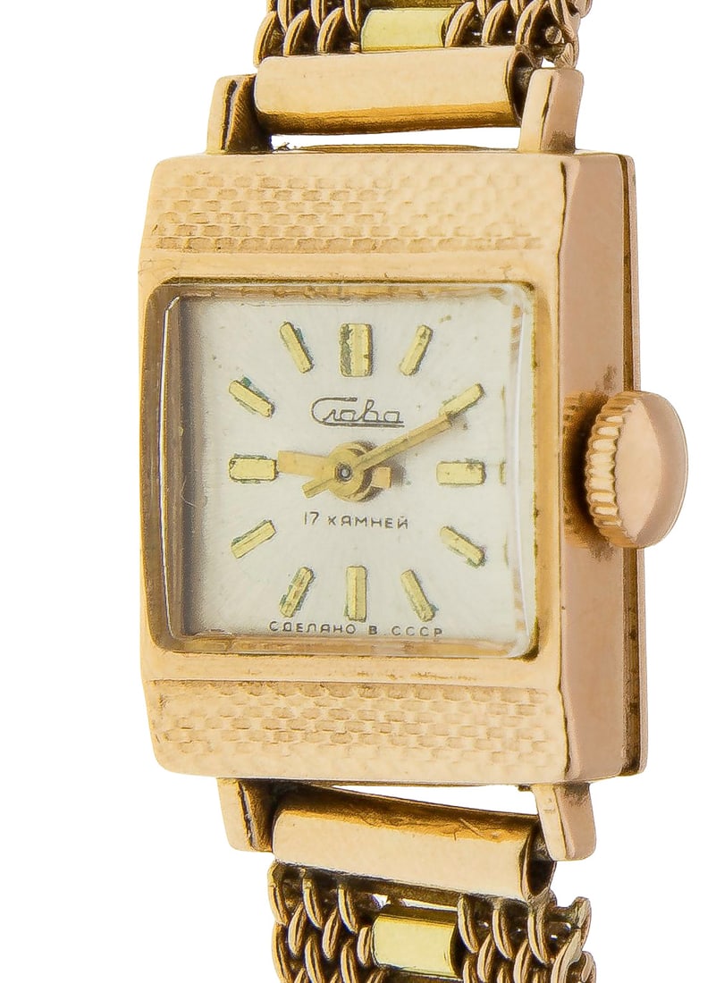 14k Yellow Gold Slava Case and Bracelet Wristwatch: 14k Yellow Gold Slava Case and Bracelet Wristwatch Having a rectangular champagne dial, gold-tone hands, stick indices, manual wind, on a mesh bracelet (marked '583' on case and bracelet) Property