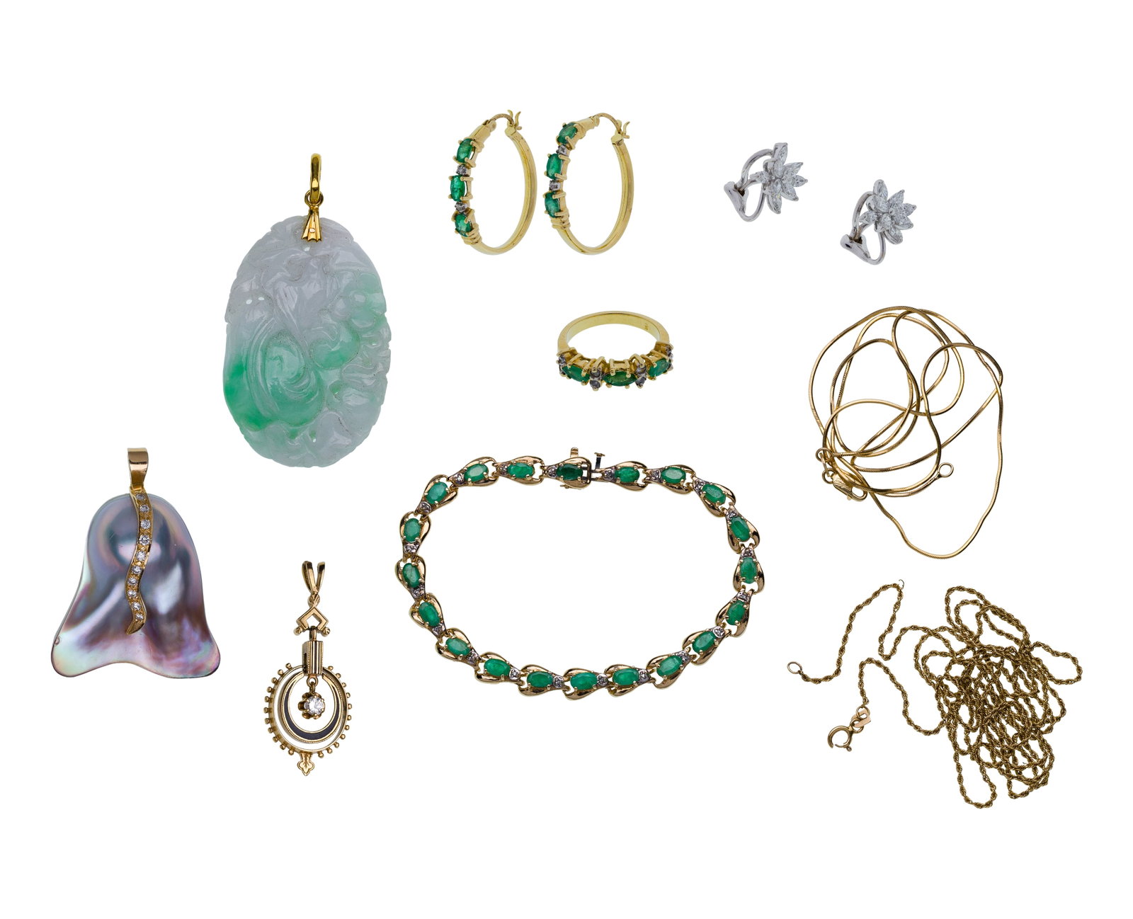 14k and 10k Yellow Gold Jewelry Assortment: 14k and 10k Yellow Gold Jewelry Assortment (9) items including a pair of French clip diamond earrings in a floral setting, an emerald and diamond ring, (3) pendants consisting of a diamond accented,