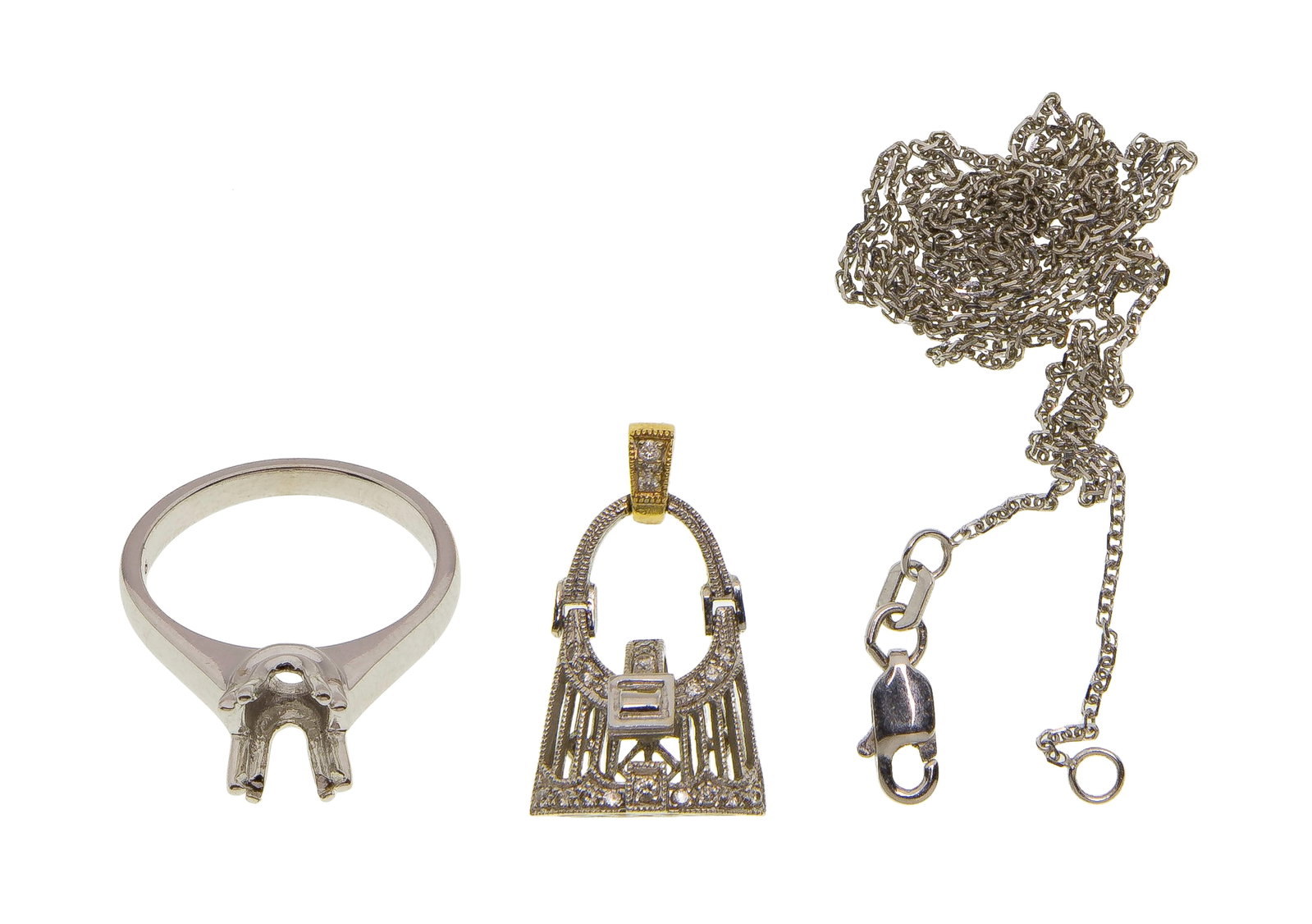 18k and 14k White Gold Jewelry Assortment: 18k and 14k White Gold Jewelry Assortment (3) items including a two-toned articulated purse pendant having accent diamonds and a chain style necklace (marked '18k') as well as a solitaire style ring
