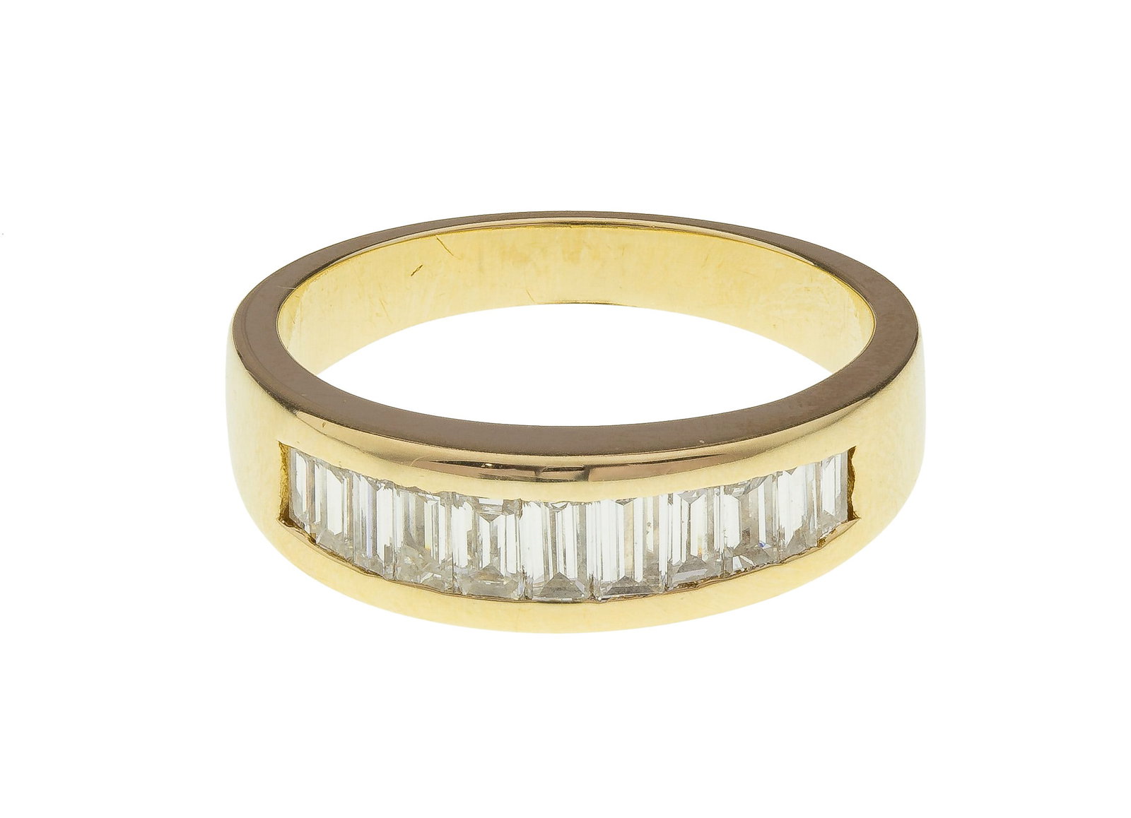 14k Yellow Gold and Diamond Ring: 14k Yellow Gold and Diamond Ring A band having eleven channel set baguettes weighing approximately 1.30 carats total, G color, VVS-2 clarity (marked '14k'), having appraisal Property from: a Private C