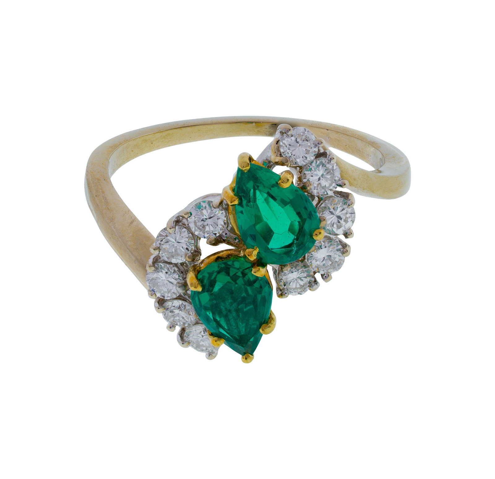 18k White Gold, Emerald and Diamond Ring: 18k White Gold, Emerald and Diamond Ring Having two pear cut emeralds accented by ten round cut diamonds, in Loves Jeweler presentation box Property from: a Private Collector, Winfield, Illinois