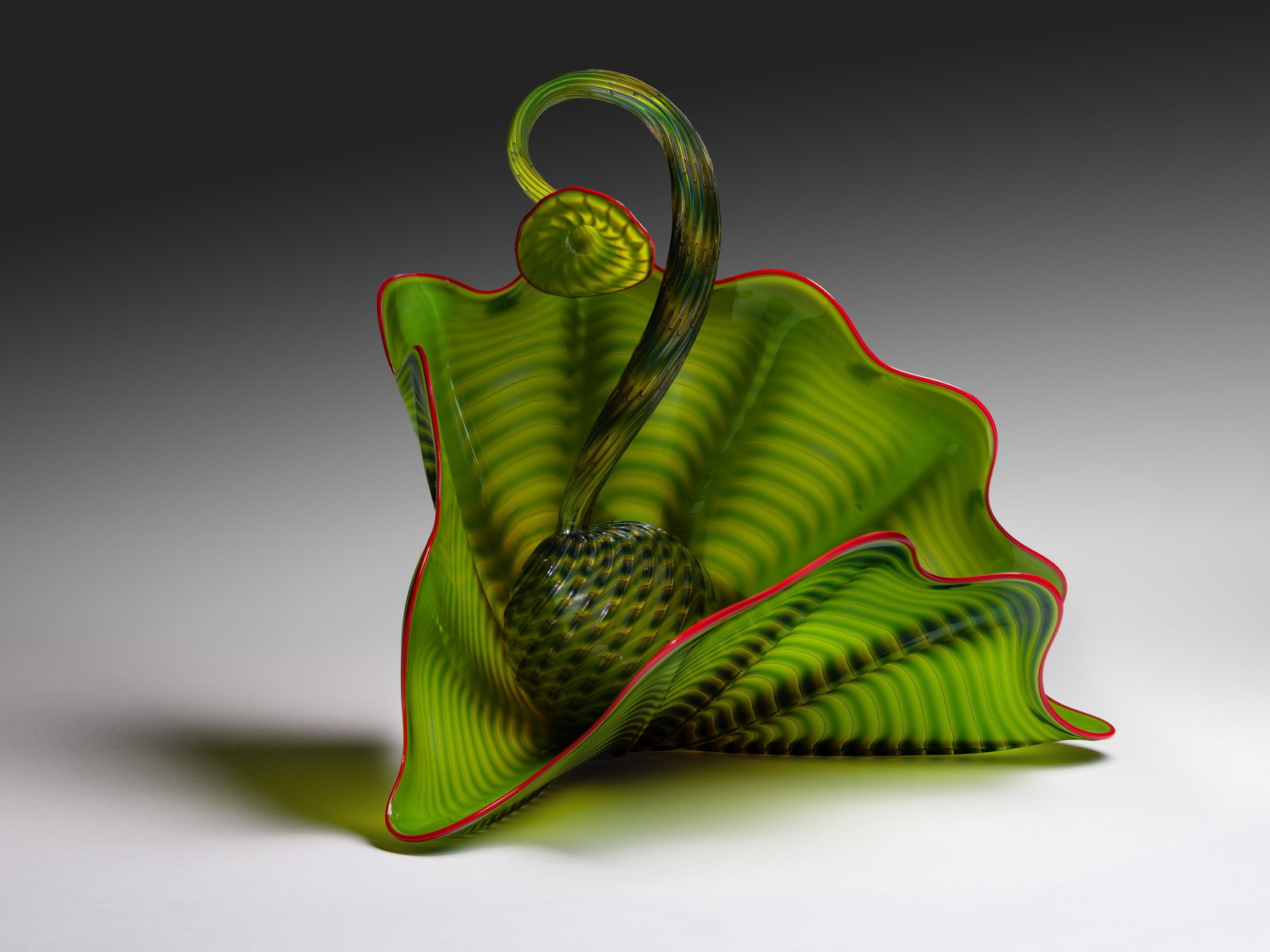 Dale Chihuly (American, b.1941) 'Parrot Green Persian Set' Art Glass Sculpture: Dale Chihuly (American, b.1941) 'Parrot Green Persian Set' Art Glass Sculpture 2001 set comprising (2) hand-blown glass pieces having hues of parrot green with red lip wrap, the smaller curving bulb-b