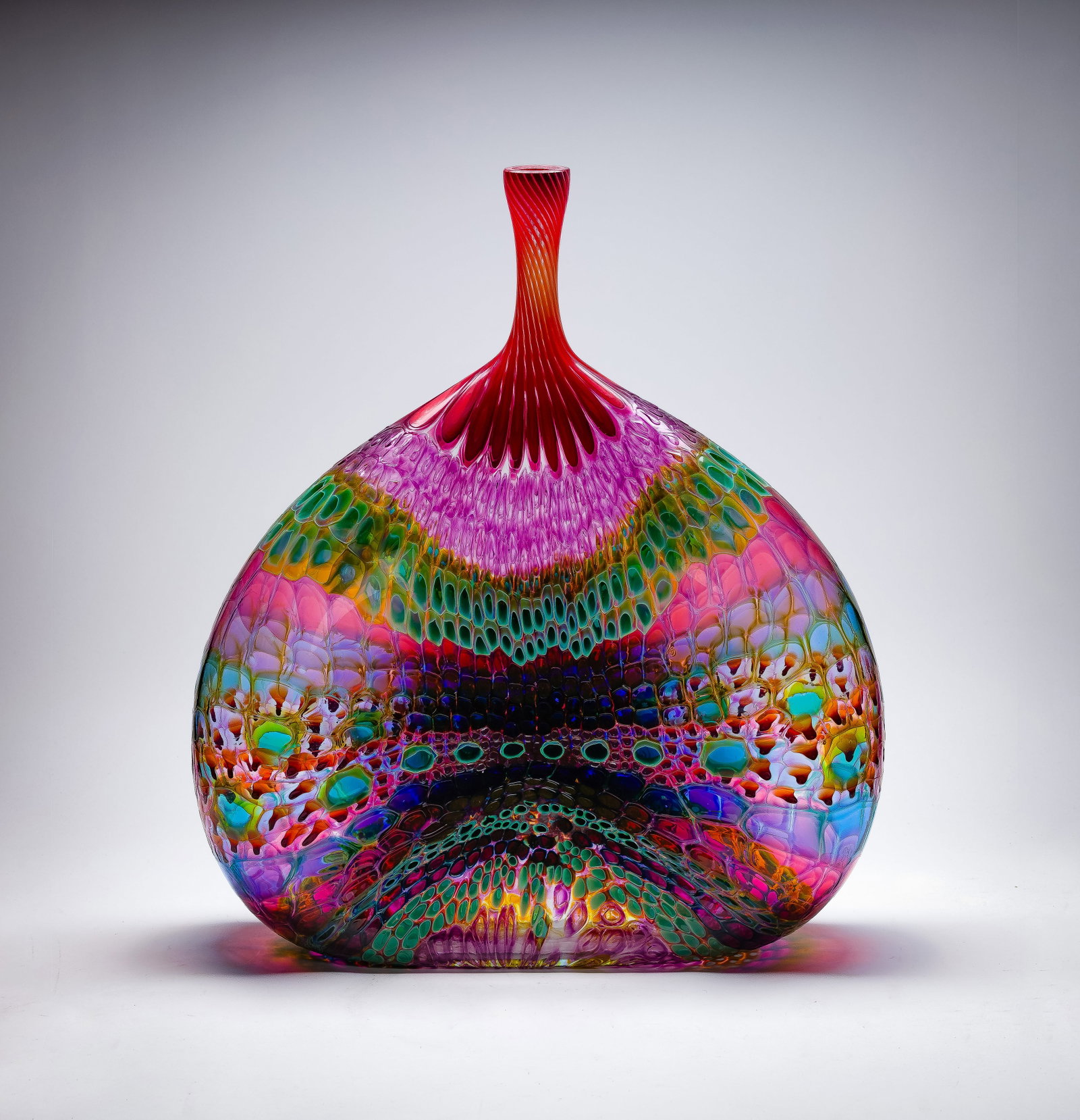 Steven Rolfe Powell (American, 1951-2019) 'Teasing Sigh Johnson' Art Glass Vessel: Steven Rolfe Powell (American, 1951-2019) 'Teasing Sigh Johnson' Art Glass Vessel 1996, signed, hand blown vessel having a bulbous teardrop body tapering to a narrow neck, vibrant patterning in hues o