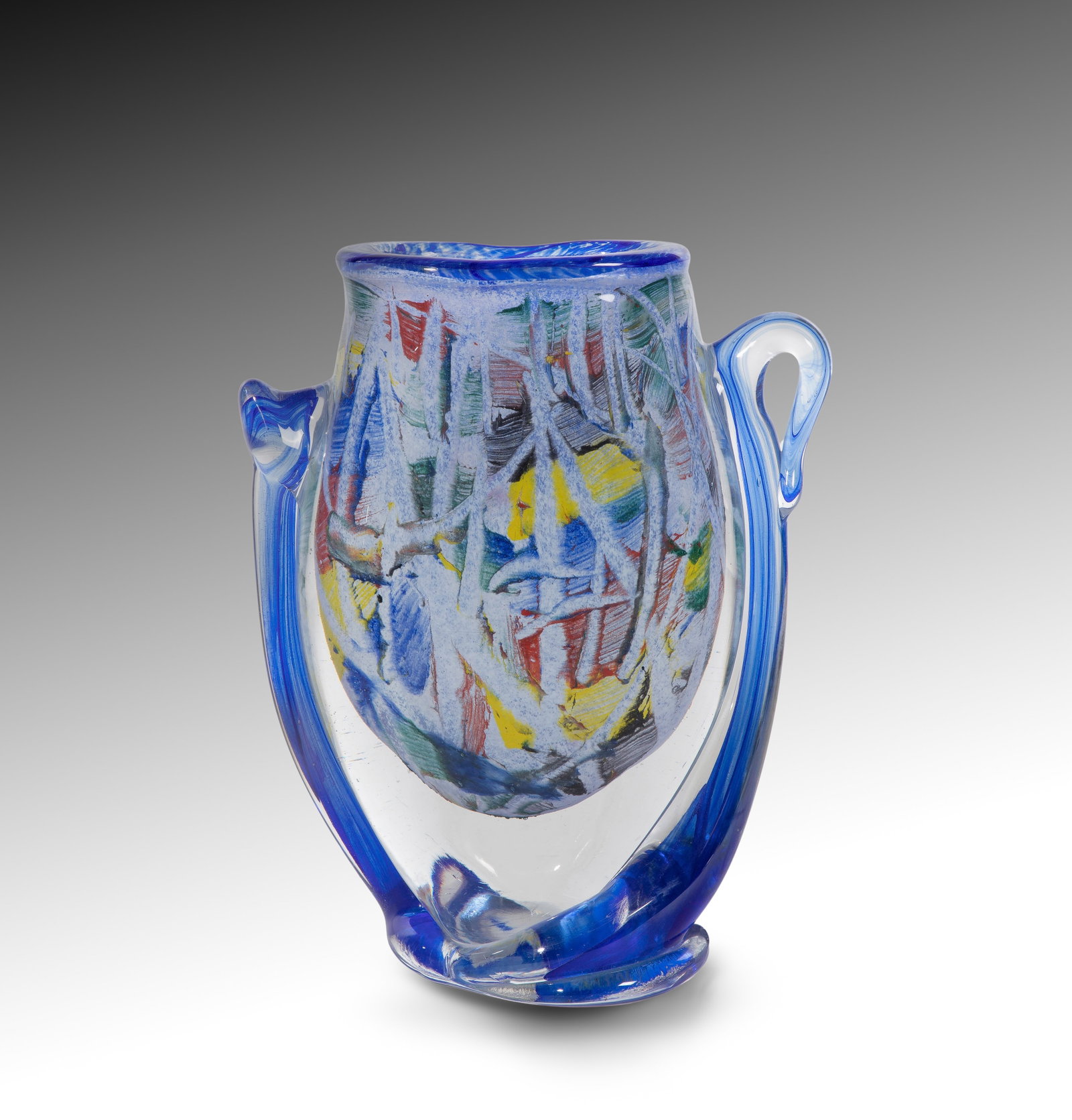 Jean Claude Novaro (French, 1943-2015) Art Glass Vase: Jean Claude Novaro (French, 1943-2015) Art Glass Vase 1996, etch signed, having a heavy, clear outer casing, applied cobalt blue handles and base wraps, interior core decorated with a multi-colored ab