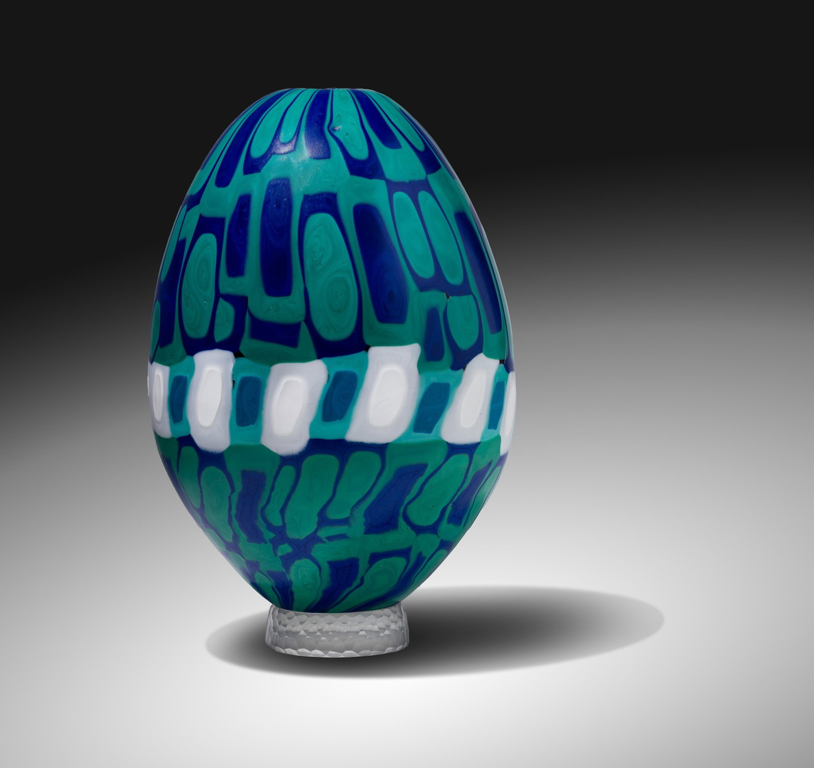 Joseph Pagano (American, b.1965) Art Glass: Joseph Pagano (American, b.1965) Art Glass 1999, etch signed, capturing fluid organic movement, using vibrant colors, utilizing colored glass rods to create designs, set on a faceted glass foot