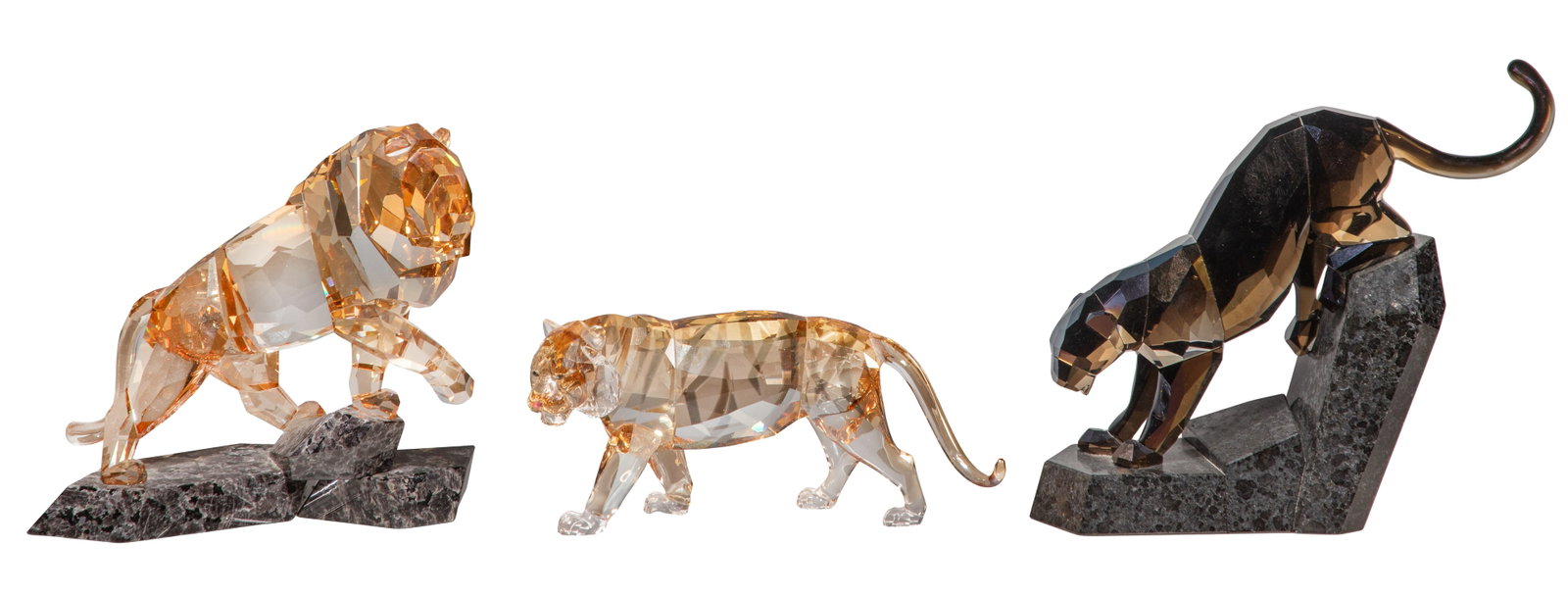 Swarovski Crystal Figurine Assortment: Swarovski Crystal Figurine Assortment (3) items, (2) from the Soulmate series including a Moroda panther on a black granite base and the Golden Shadow lion on a hard rock base as well as a tiger from