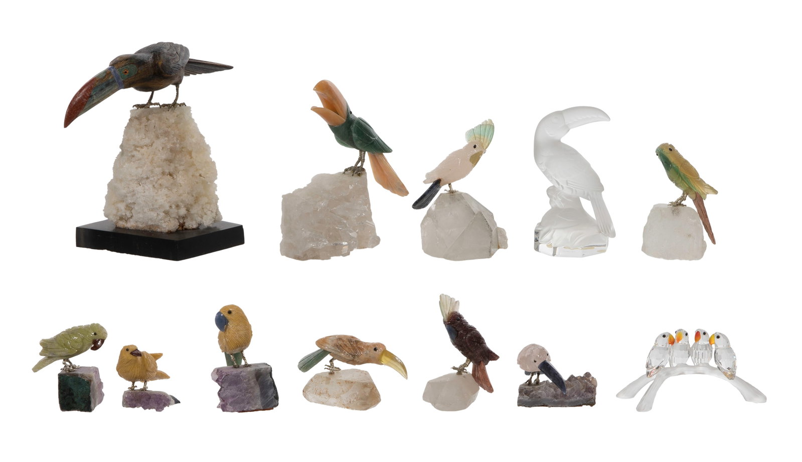 Carved Stone Bird Figurine Assortment: Carved Stone Bird Figurine Assortment (12) total items including a toucan of tiger's eye, jasper, chrysocolla and amazonite having bronze feet perched on a base of calcite and dolomite, an Amsterdam