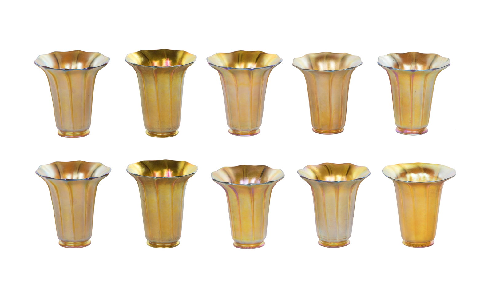 Quezal Favrile Glass Lamp Shades: Quezal Favrile Glass Lamp Shades (10) matching iridescent gold-tone trumpet flower form shades having etched Quezal marks, fitting collars 2.25-inch outer diameter, 1.625-inch opening Property from: