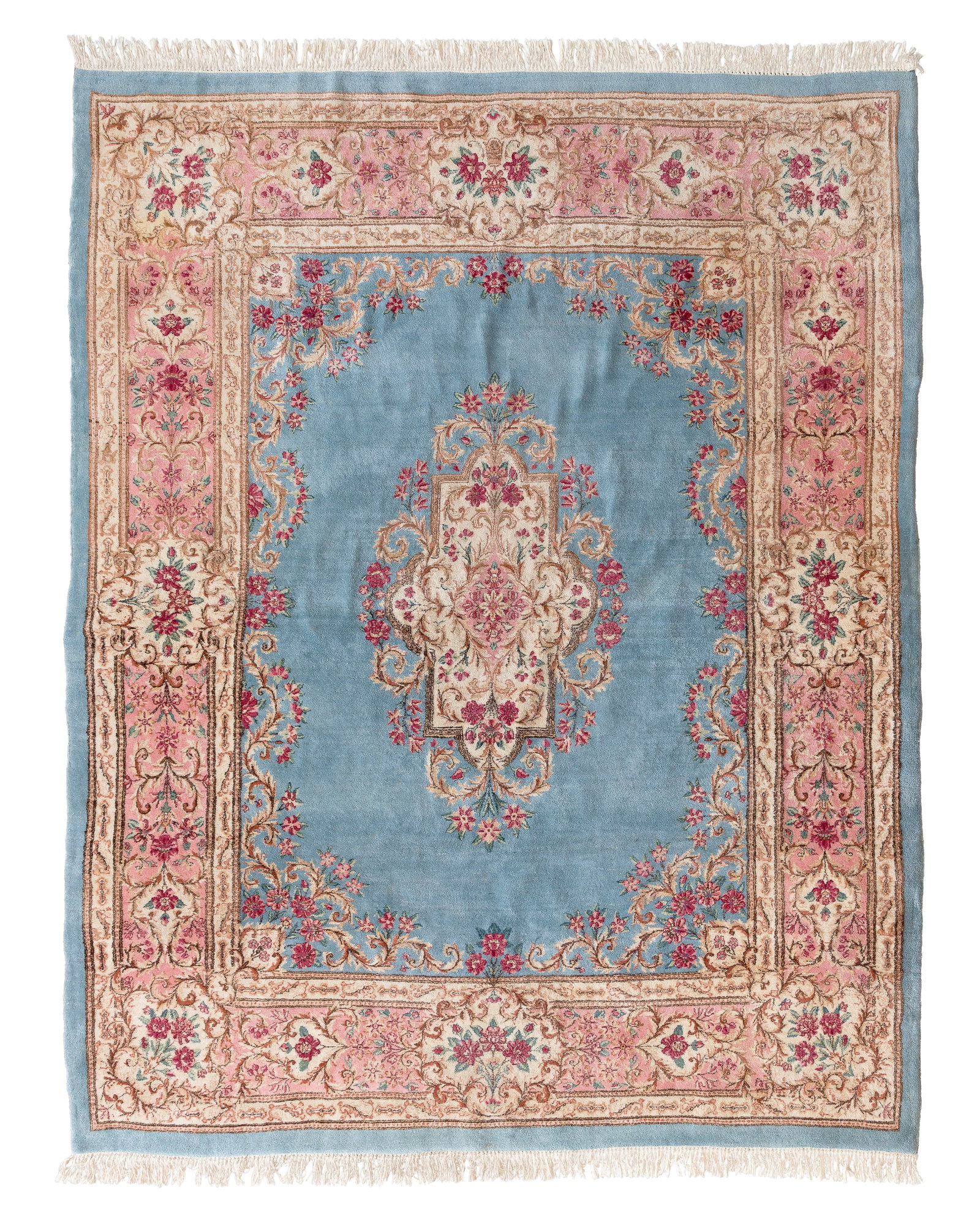 Persian Wool Rug: Persian Wool Rug Hand knotted, having a center medallion in a floral design in hues of pink, cranberry, brown and cream on a blue field Property from: an Estate, Marshfield, Wisconsin Rug Size: 9 ft.