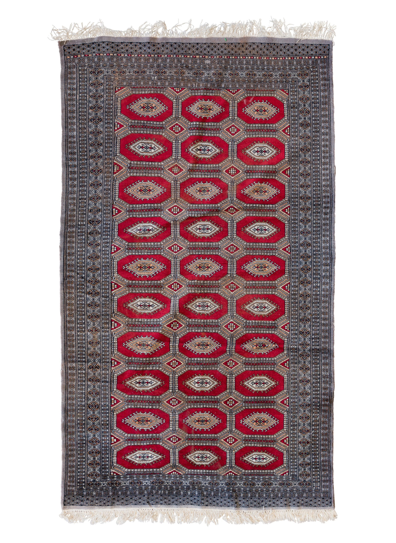 Persian Wool Rug: Persian Wool Rug Hand knotted, a geometric design in hues of grey, cream and tan on a red field Property from: an Estate, Madison, Wisconsin Rug Size: 8 ft. 5in. by 5 ft. 2 in. Condition: overall ligh