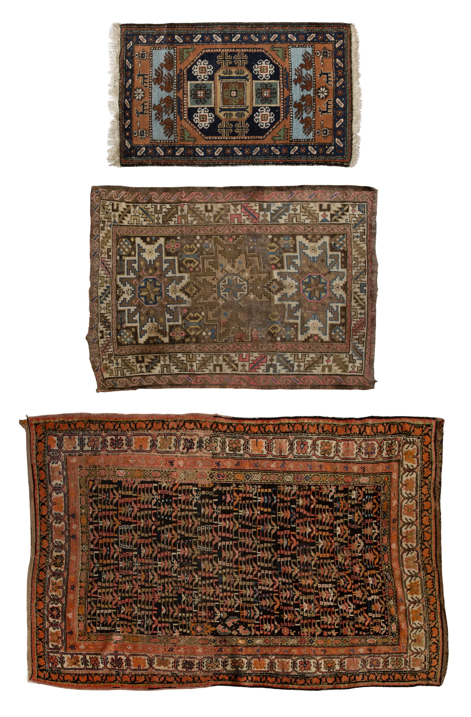 Persian Wool Rug Assortment: Persian Wool Rug Assortment (3) items including a geometric design in hues of blue, cream, salmon, tan, orange, on a brown field, a geometric design in hues of blue, cream, pink, tan and black on a br