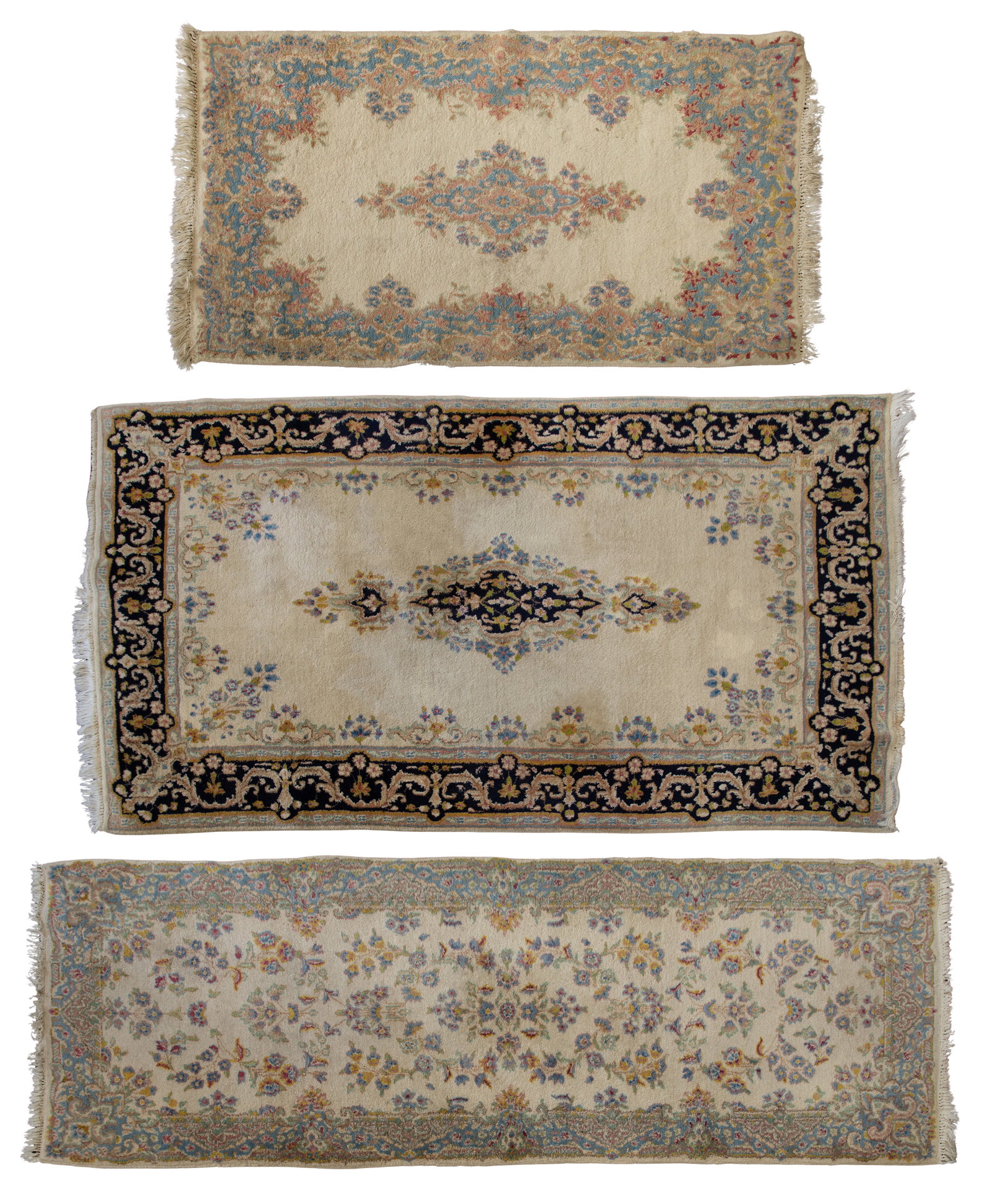 Persian Wool Rug Assortment: Persian Wool Rug Assortment (3) similar items, all handwoven and having floral designs in hues of blue, pink and green on a cream field, (2) having center medallions (smallest 4 ft 9 in. x 2 ft. 8