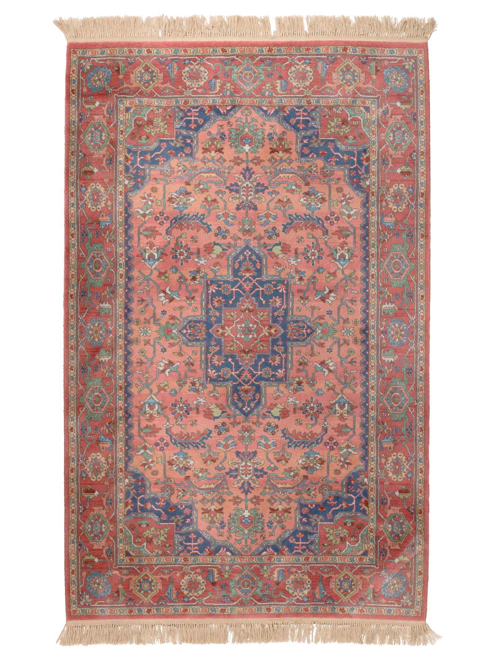 Karastan Serapi Medallion Wool Rug: Karastan Serapi Medallion Wool Rug Having a geometric design in hues of blue, green and pink on a coral field, retaining original label Property from: a Private Collector, Lake Forest, Illinois Rug