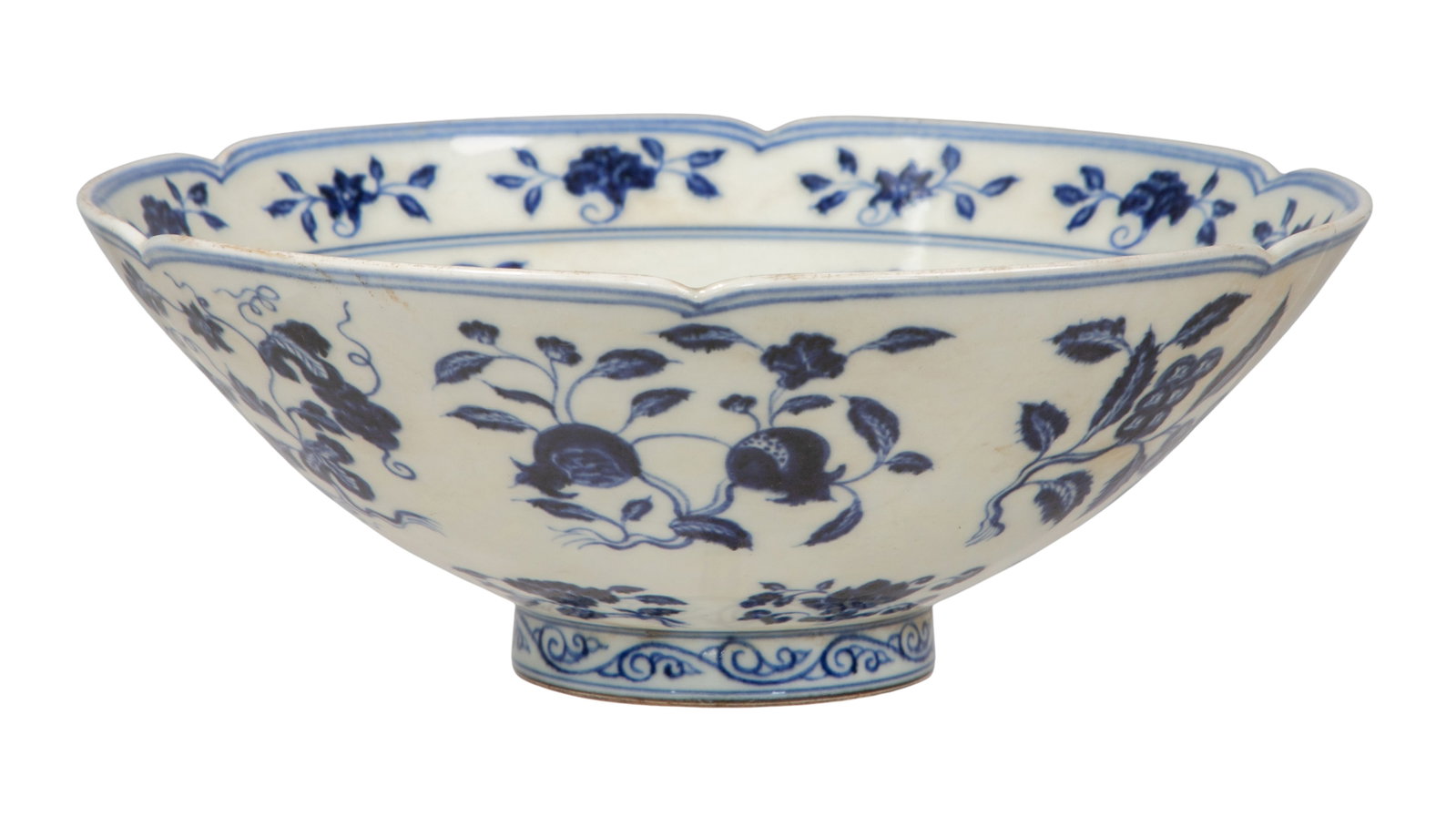 Chinese Ming Style Blue and White Porcelain Bowl: Chinese Ming Style Blue and White Porcelain Bowl Flaring from the short foot, curving walls rising to a foliate rim, underglaze blue floral scrolls to interior and exterior, a 6-character Xuande withi