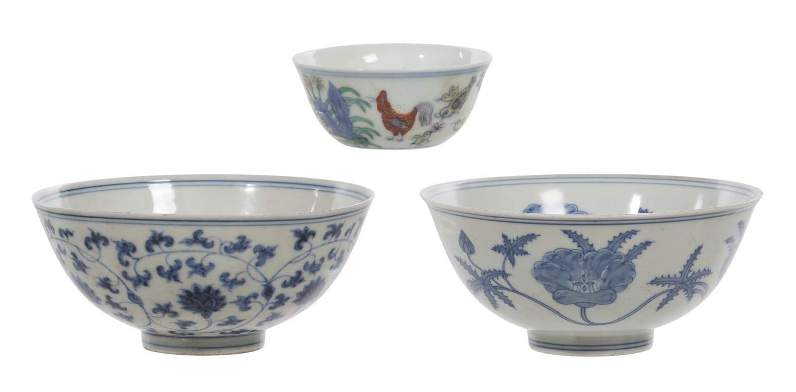Chinese Porcelain Assortment: Chinese Porcelain Assortment (3) items including (2) blue and white porcelain bowls consisting of a floral scroll pattern and a lotus motif on the interior and exterior as well as a doucai porcelain c