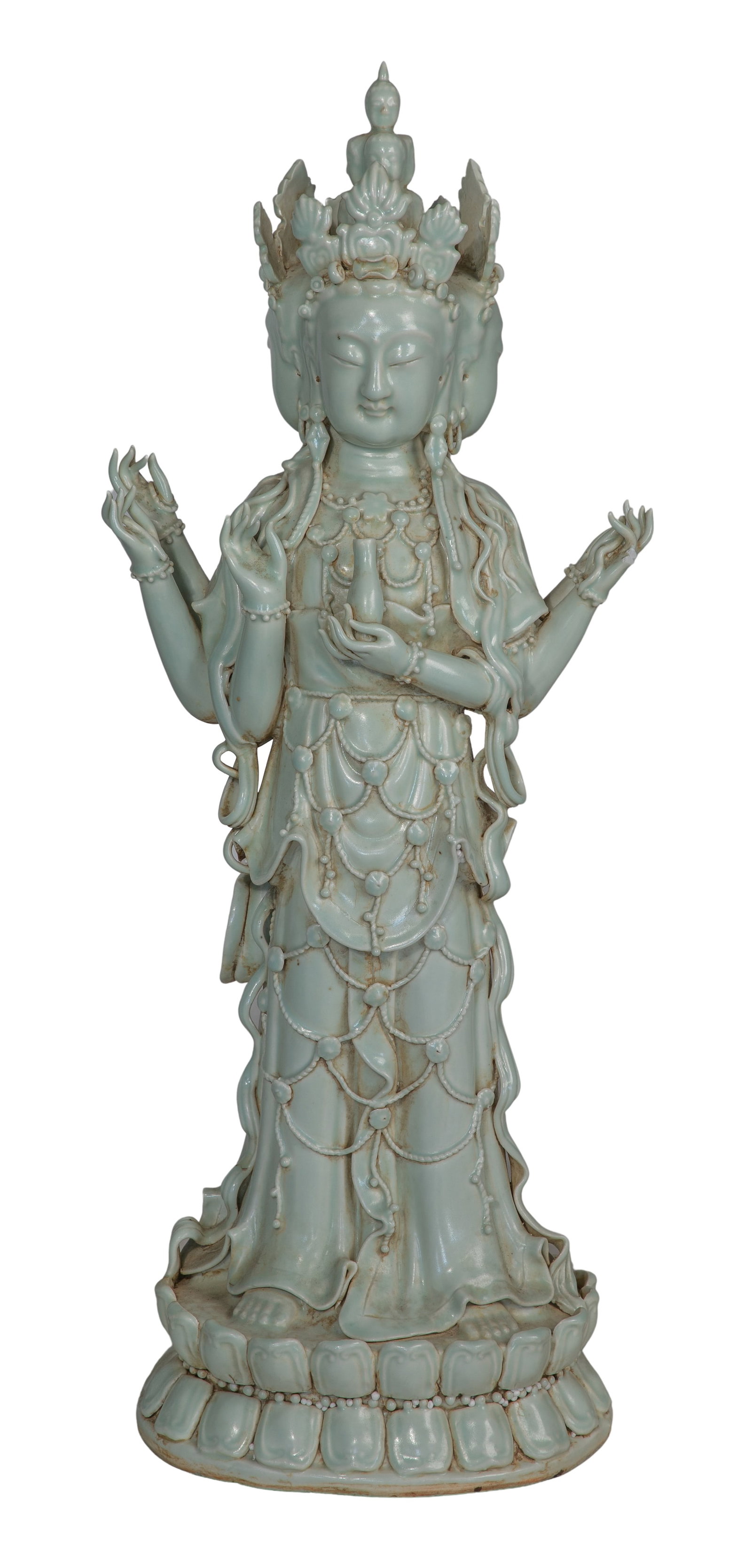 Chinese Celadon Guanyin Sculpture: Chinese Celadon Guanyin Sculpture Red ware pottery having a pale celadon glaze, an unmarked 3-faced, 6-armed depiction of the bodhisattva of compassion Property from: a Private Collector, Sanford,