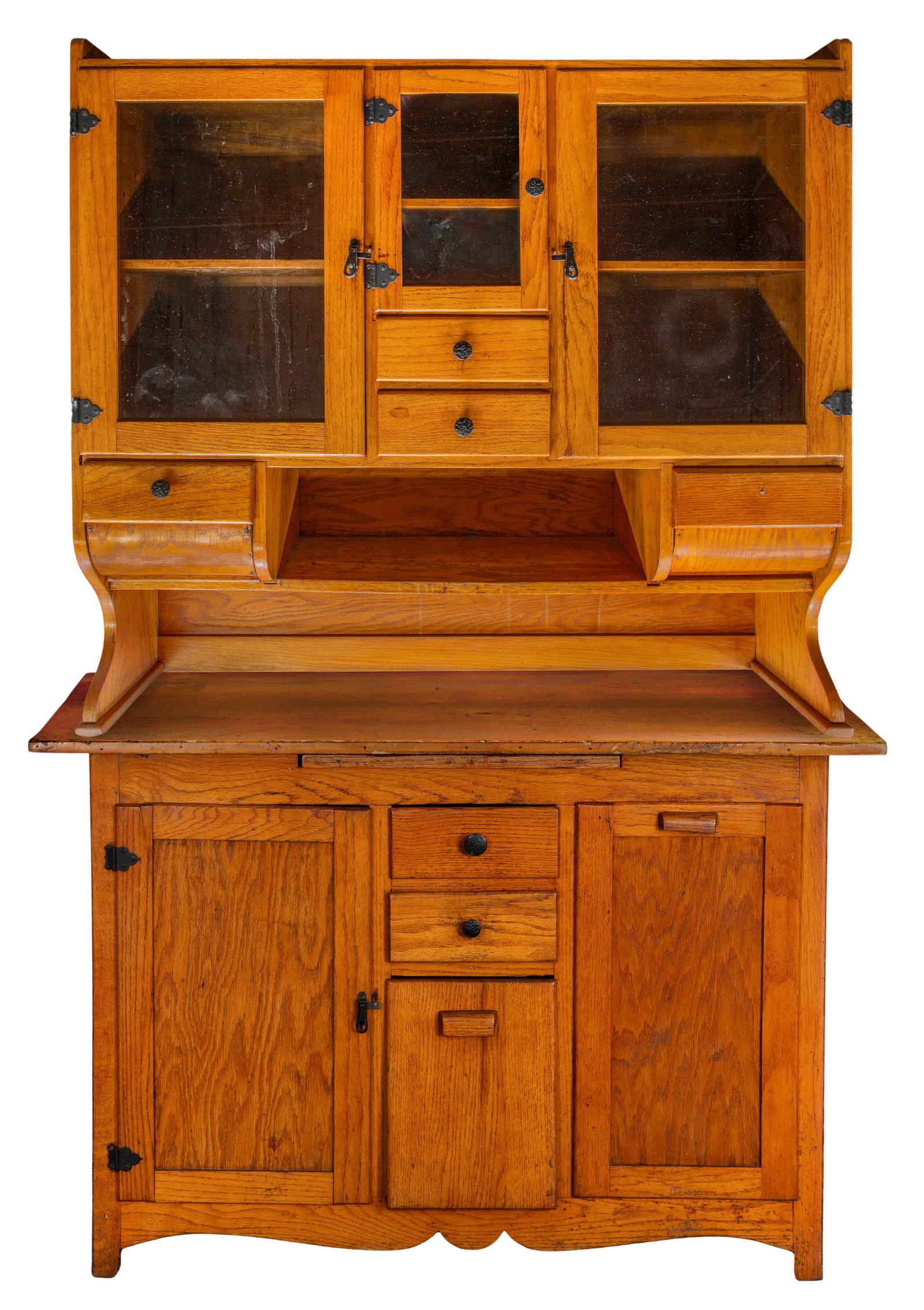 Oak Hoosier Cabinet: Oak Hoosier Cabinet Two-piece cabinet including base (31 x 46 x 25 inches) and hutch (40 x 43 x 11-inches) having glass-paneled top doors, storage bins, drawers and doors opening to shelves Property