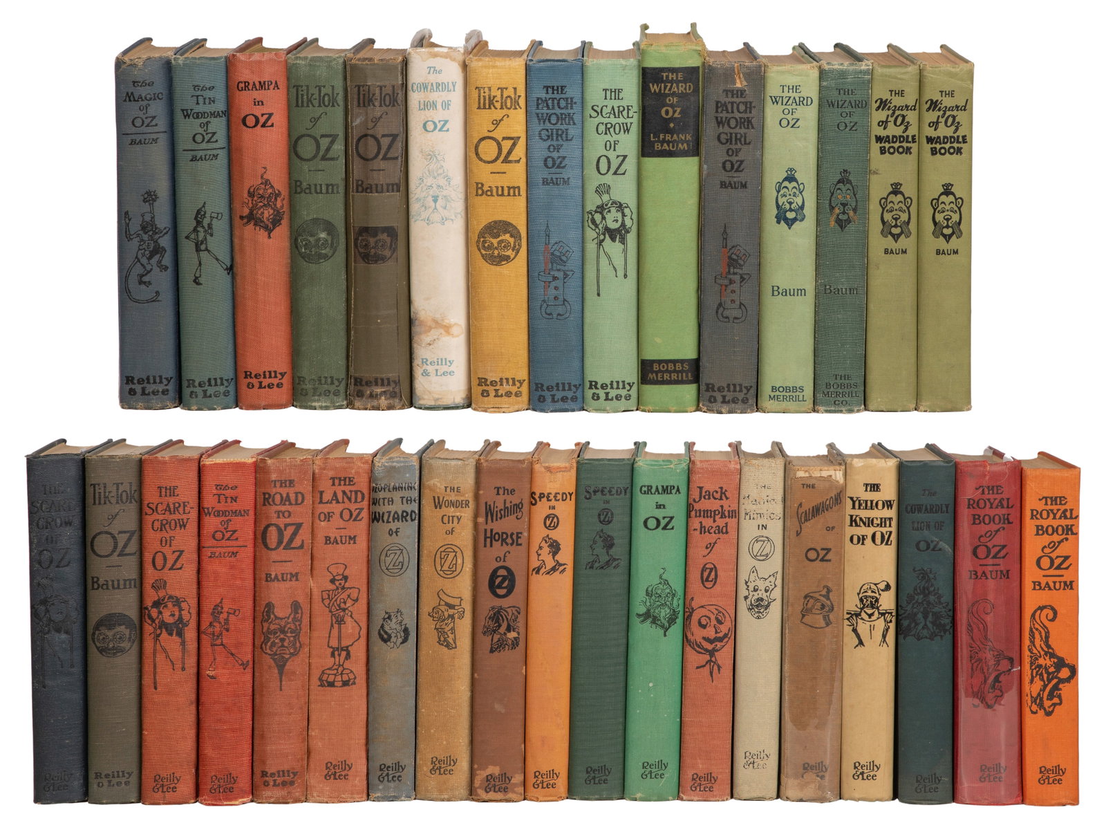 Oz Book Assortment: Oz Book Assortment (35) items by various authors including L. Frank Baum, Ruth Plumly Thompson and John Neill, early reprints or reading copies Property from: a Private Collector, Kansas City,